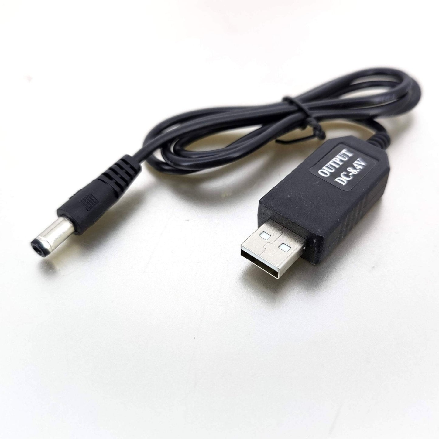 USB to 4.2V 8.4V 12.6V charging cable for 18650 lithium battery packs with LED indicators.