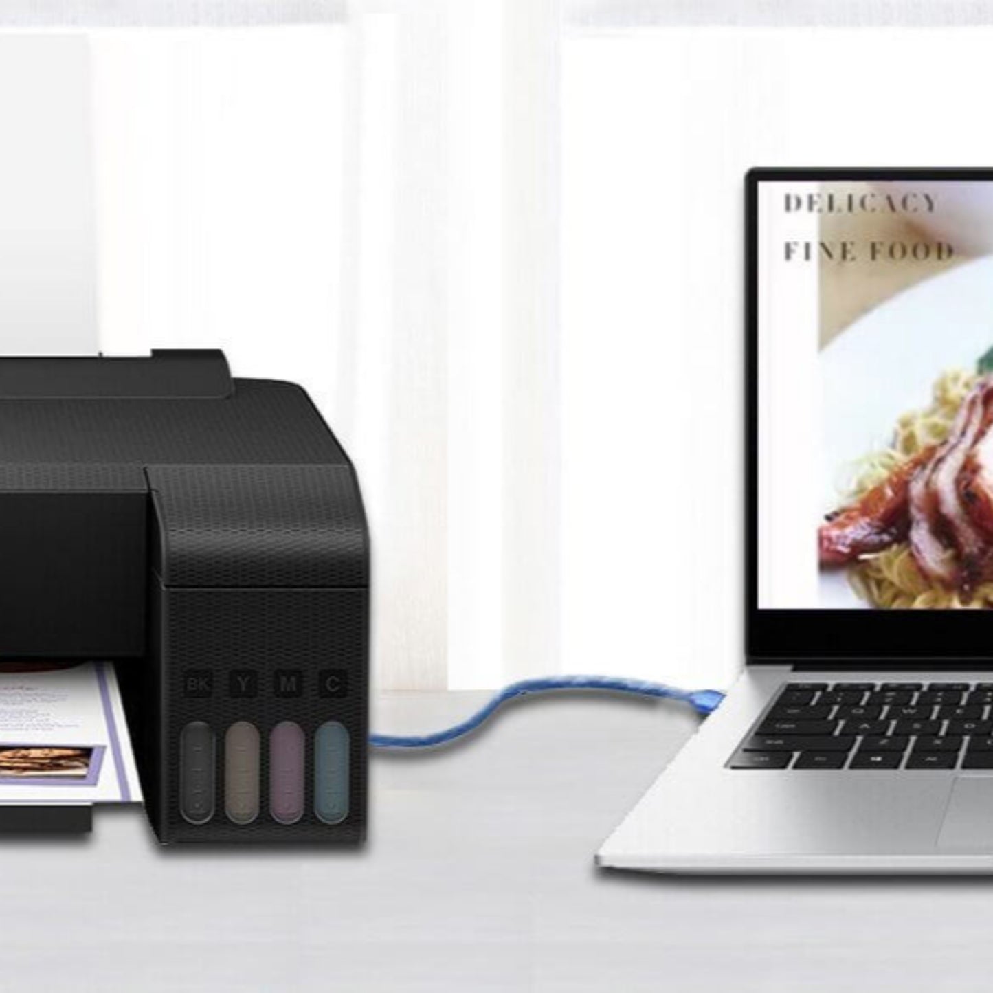 Epson printer connected to a laptop with a blue USB 2.0 A-Male to B-Male cable for high-speed data transfer.