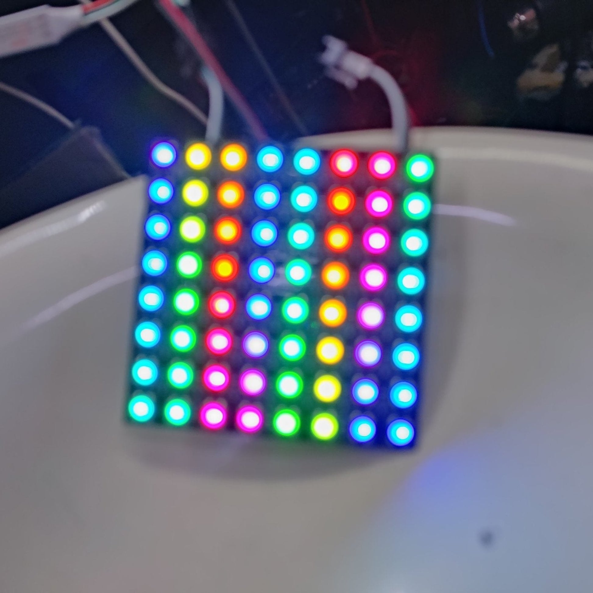 WS2812B 8x8 RGB LED Matrix Panel with 64 individually addressable colorful LEDs for vibrant displays.