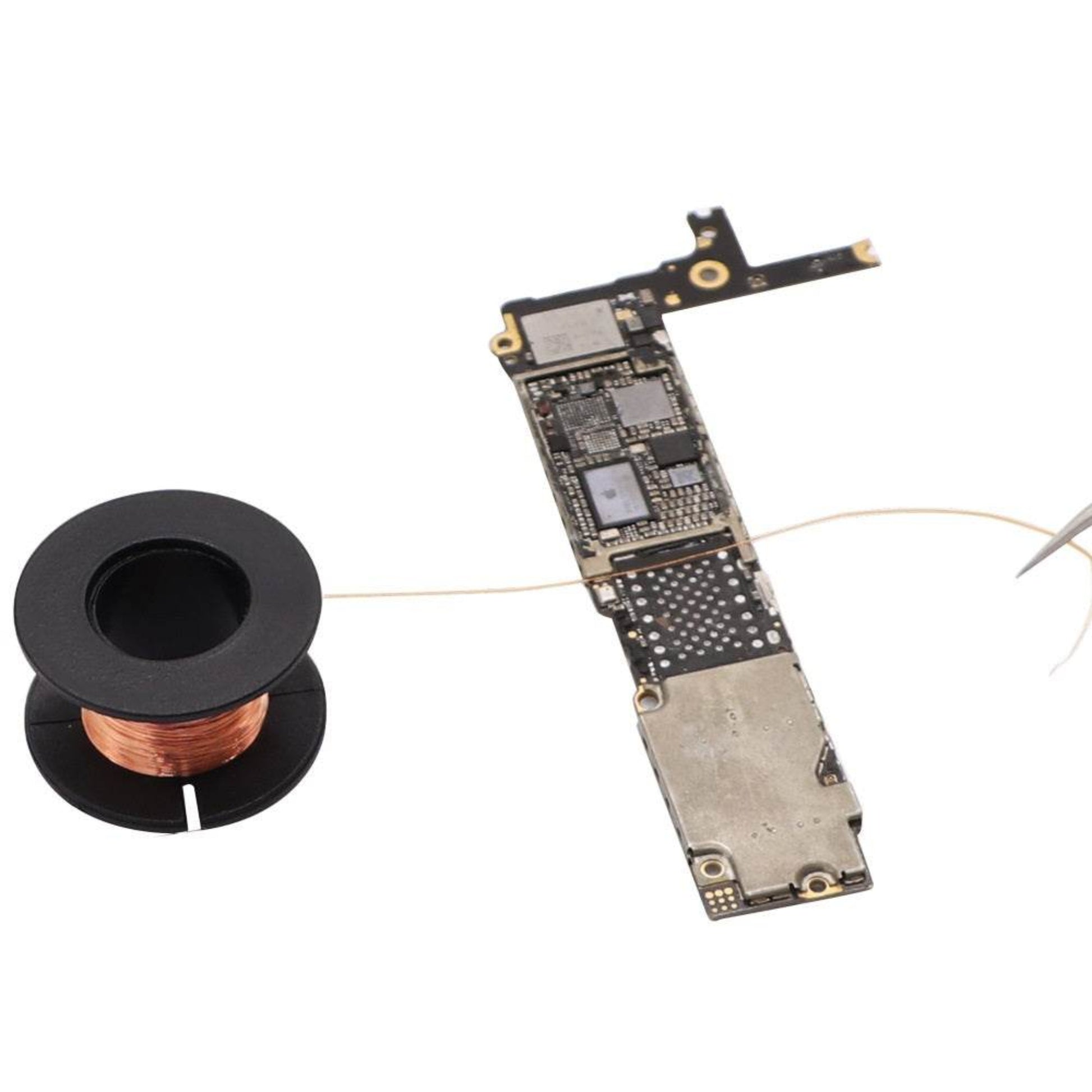 0.1mm soldering wire next to a motherboard, ideal for mobile phone and laptop repairs.