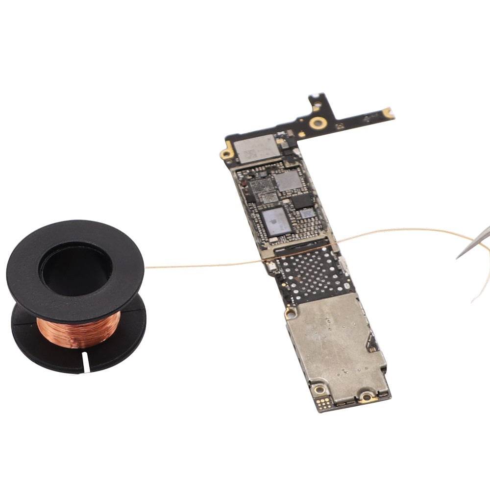 0.1mm soldering wire next to a motherboard, ideal for mobile phone and laptop repairs.
