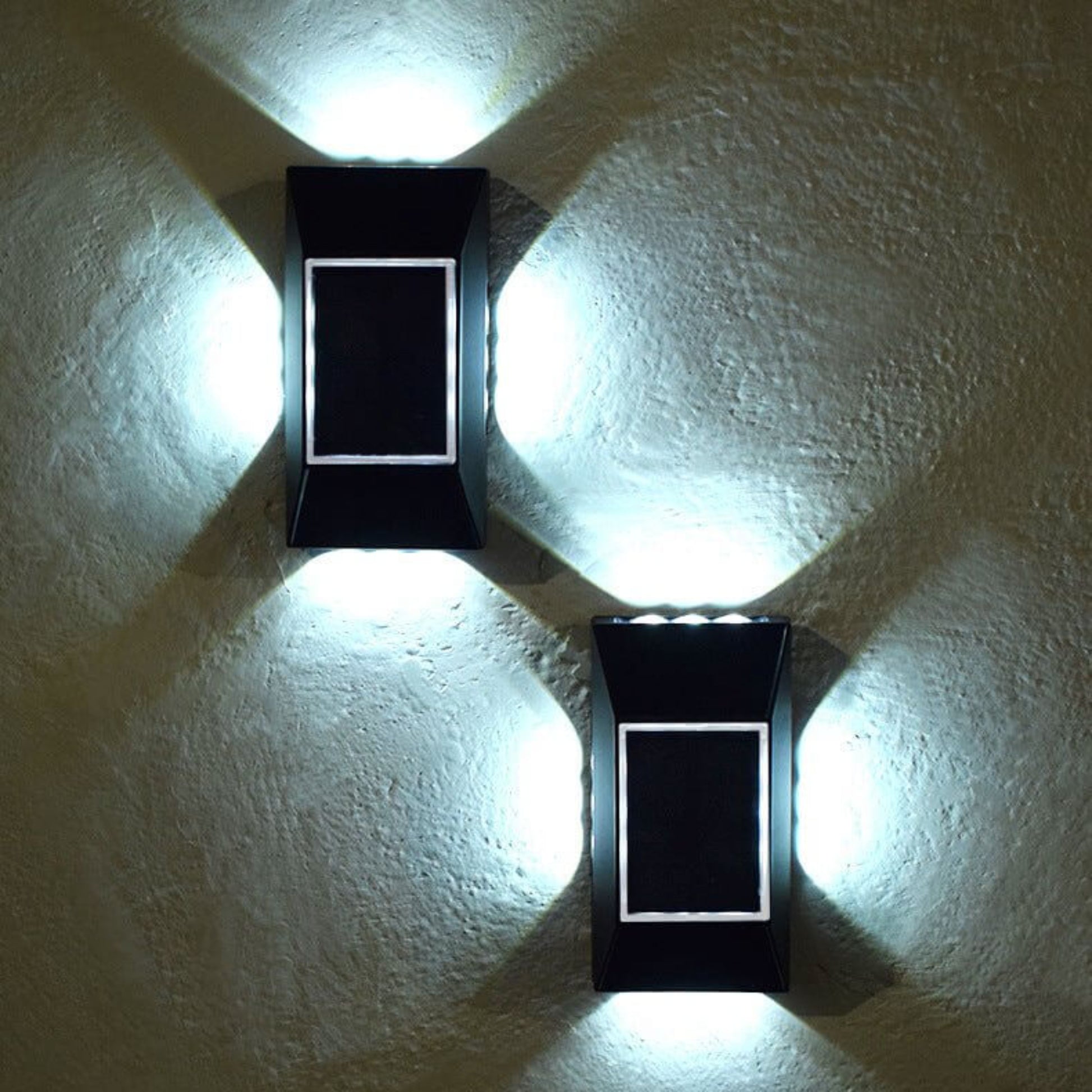12 LED solar light night view: 4-way decorative beam (up, down, left, right) in bright white.