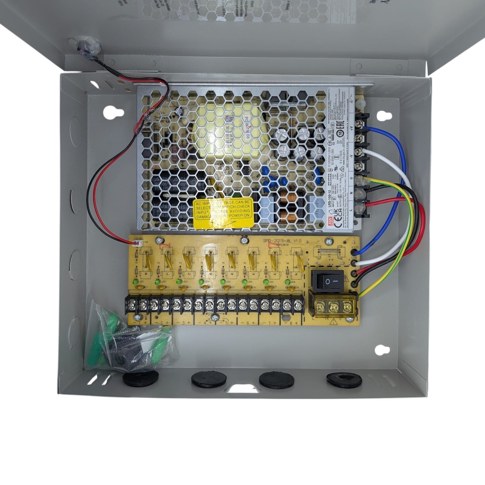Close-up of the 8 port power supply internal circuit board, showing individual channel fuses, LED indicators, and wiring terminals.