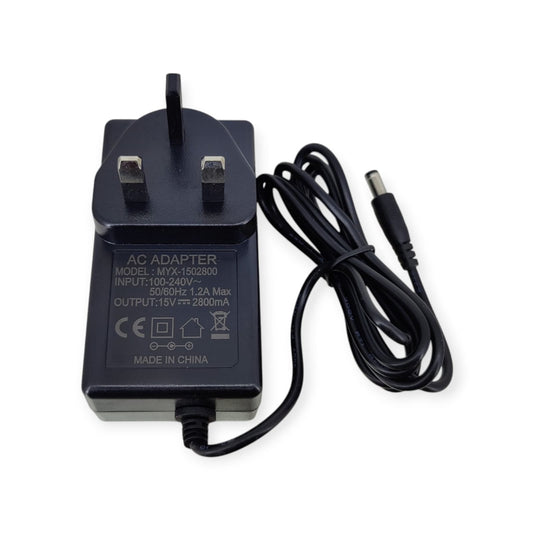 Front view of a 15V 2.8A AC adapter with UK plug, showing technical specifications.
