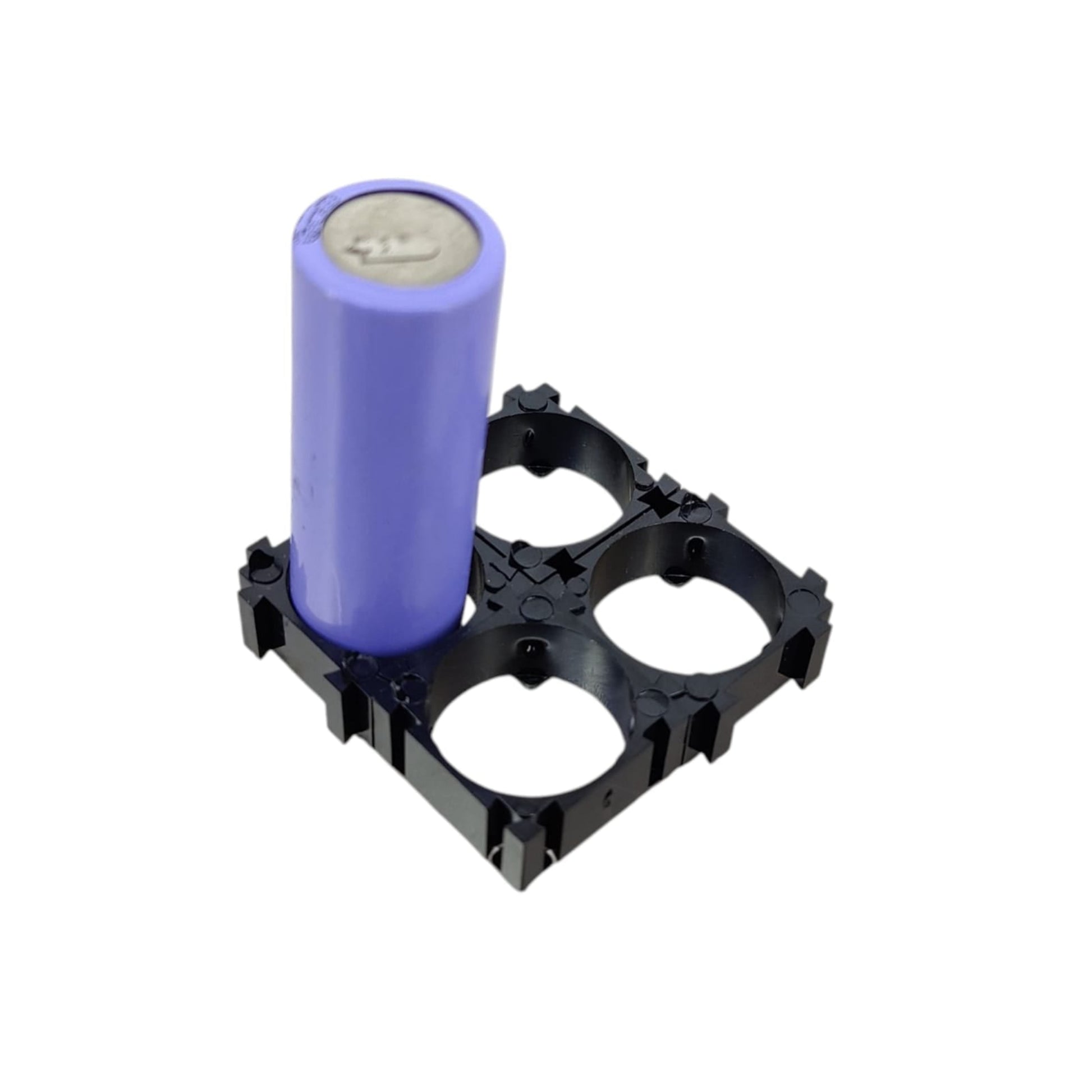 A single purple 18650 battery cell placed into a 2x2 black plastic holder bracket, demonstrating its use.