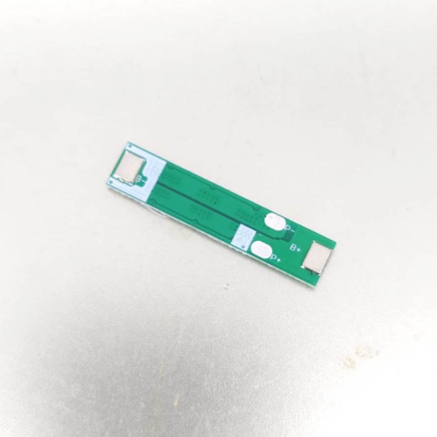 Back view of the 10A lithium battery management system highlighting the protection ICs.