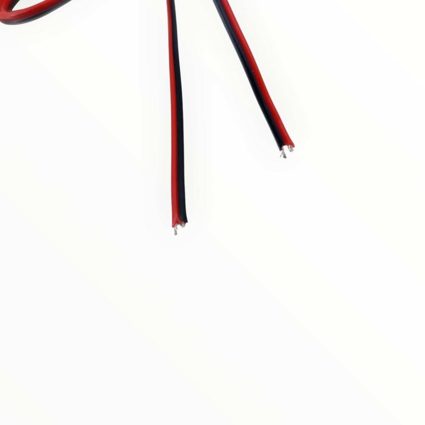 Close-up of the pre-stripped and tinned copper ends of the 24AWG red and black wire, ready for soldering.