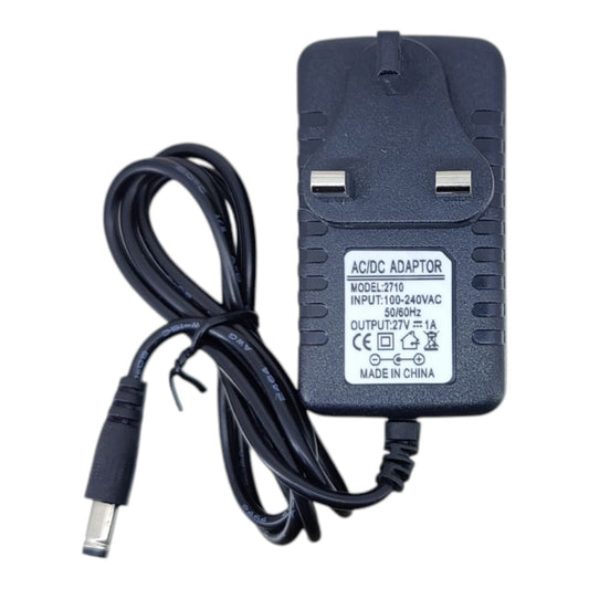 27V 1A AC/DC power adapter with UK 3-pin plug. Label shows 27V 1A output and 5.5mm x 2.1mm connector.
