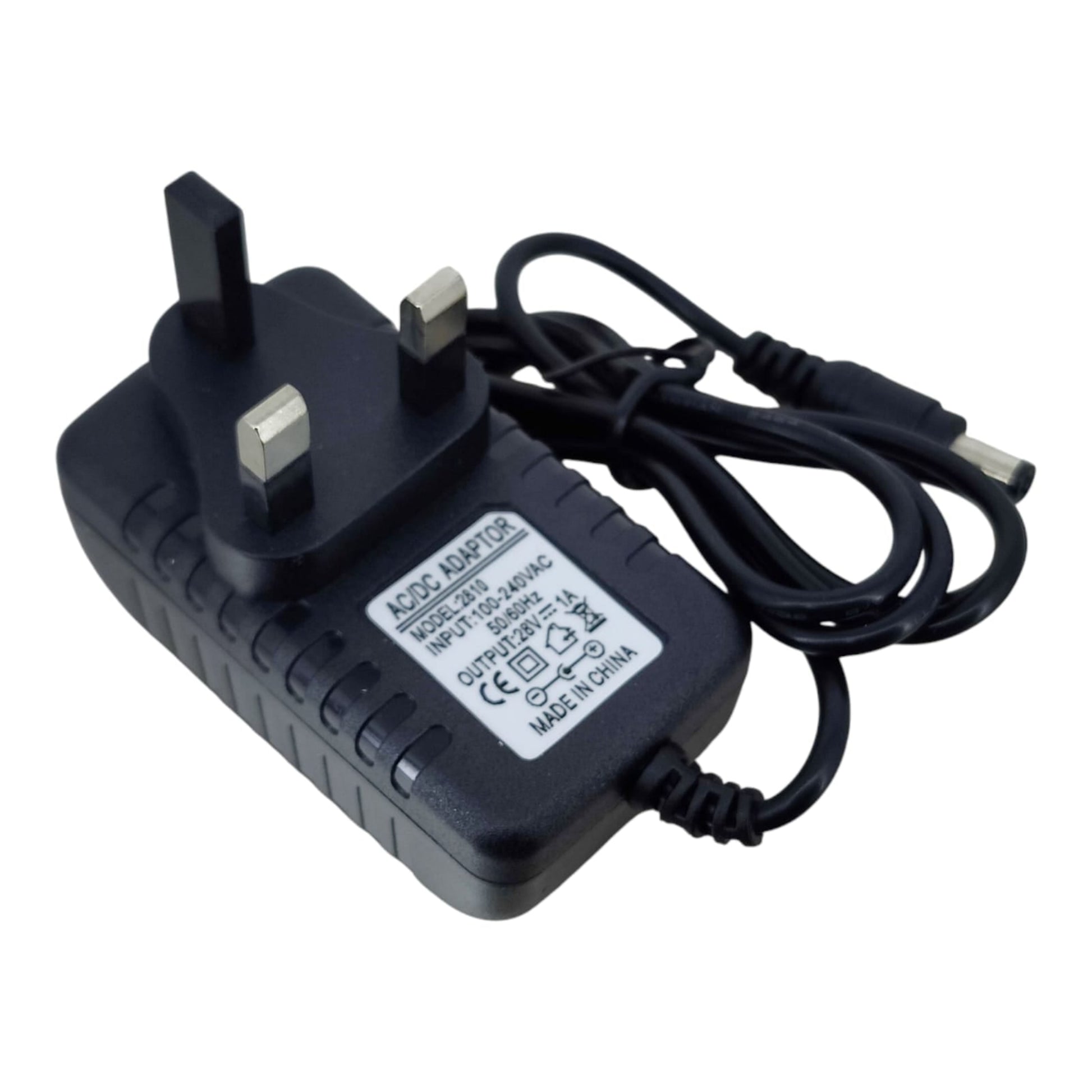 Angle view of the 28V 1A power supply, clearly showing the 3-pin UK plug and specification label.