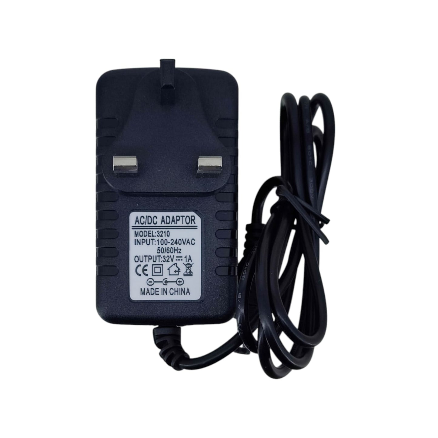 Top-down view of a 32V 1A AC/DC power adapter (Model 3210) with a UK 3-pin plug, showing technical specifications.