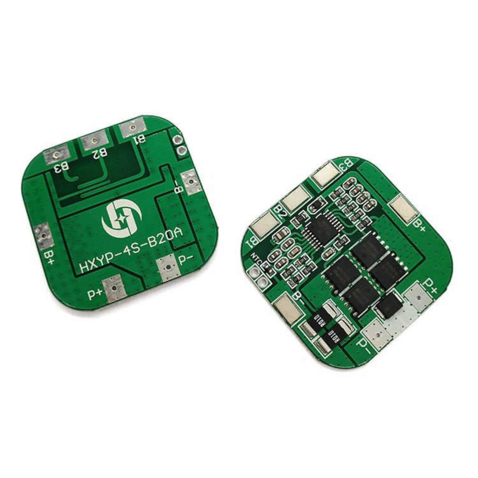Two green electronic circuit boards on a white background