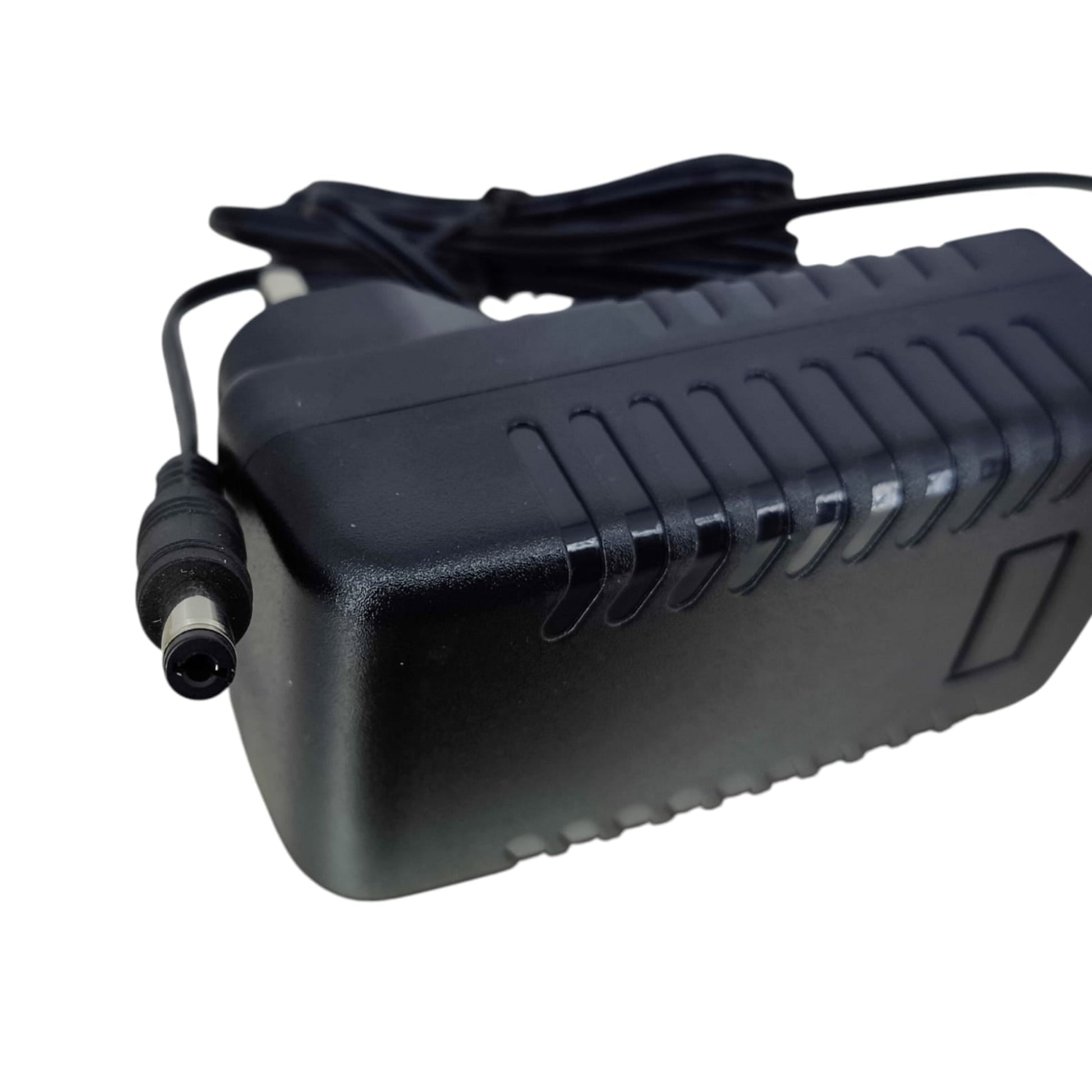 Close-up of 5.5mm x 2.1mm DC barrel connector tip for 12V electronics.