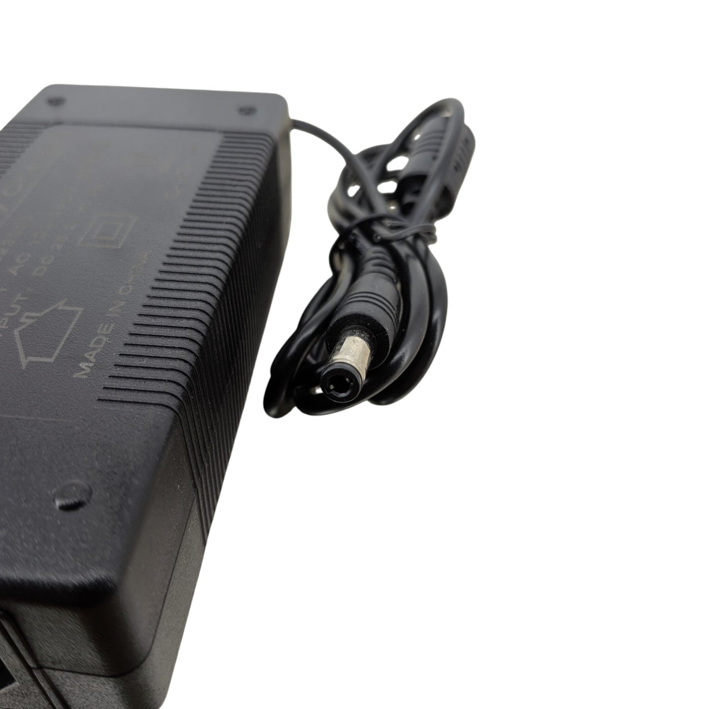 Close-up of the 5.5mm x 2.5mm DC barrel connector, fully compatible with 2.1mm ports for e-bikes and scooters.