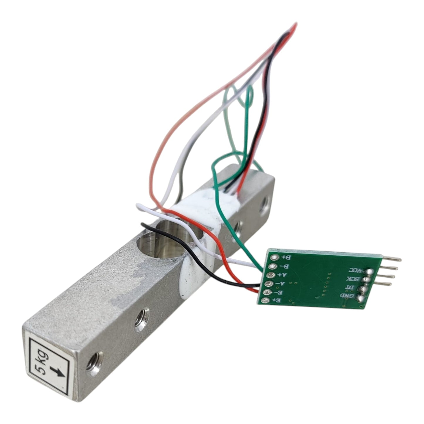Close-up showing the red, black, green, and white wire connections on the 5kg load cell.