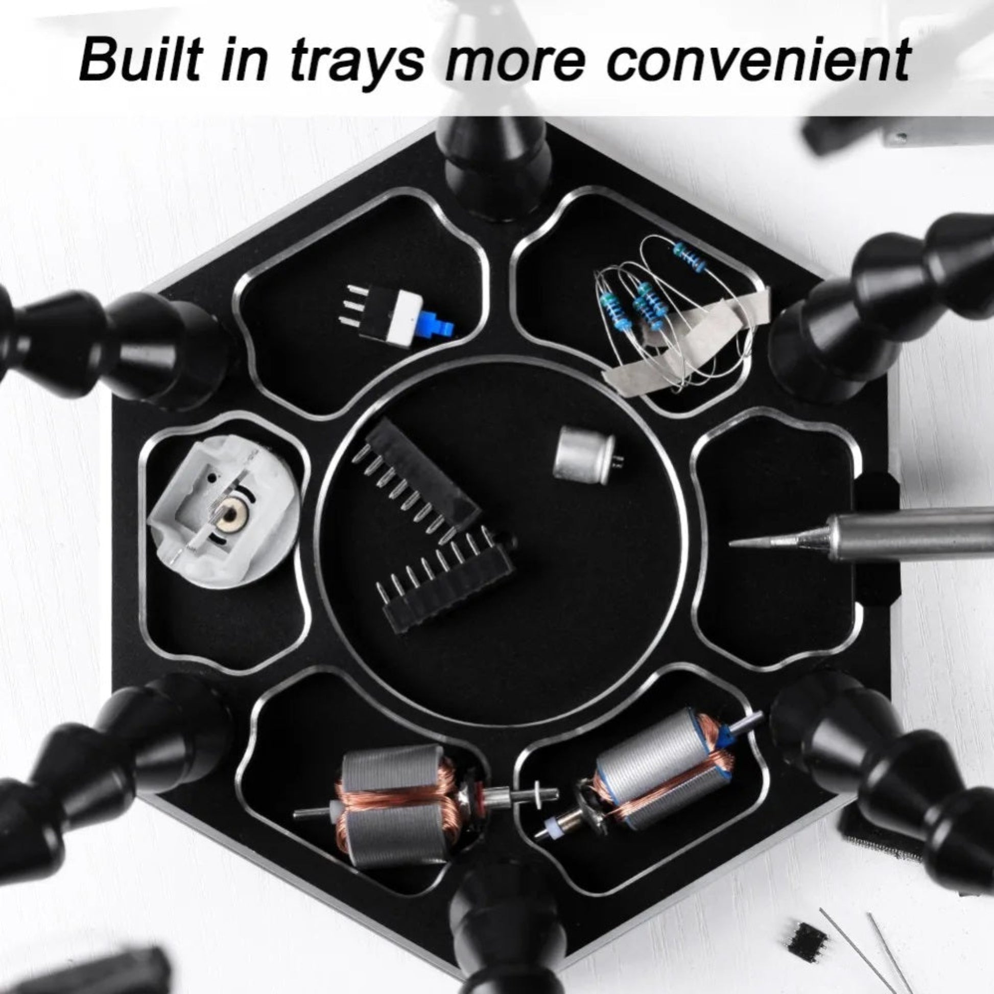 Soldering station with built-in trays for convenient organization of tools and components.