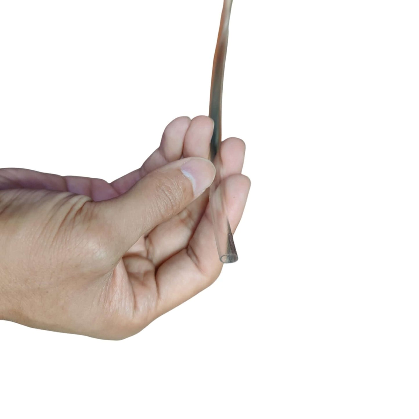 Detailed view of 6mm clear vinyl tubing held in hand showing flexibility.