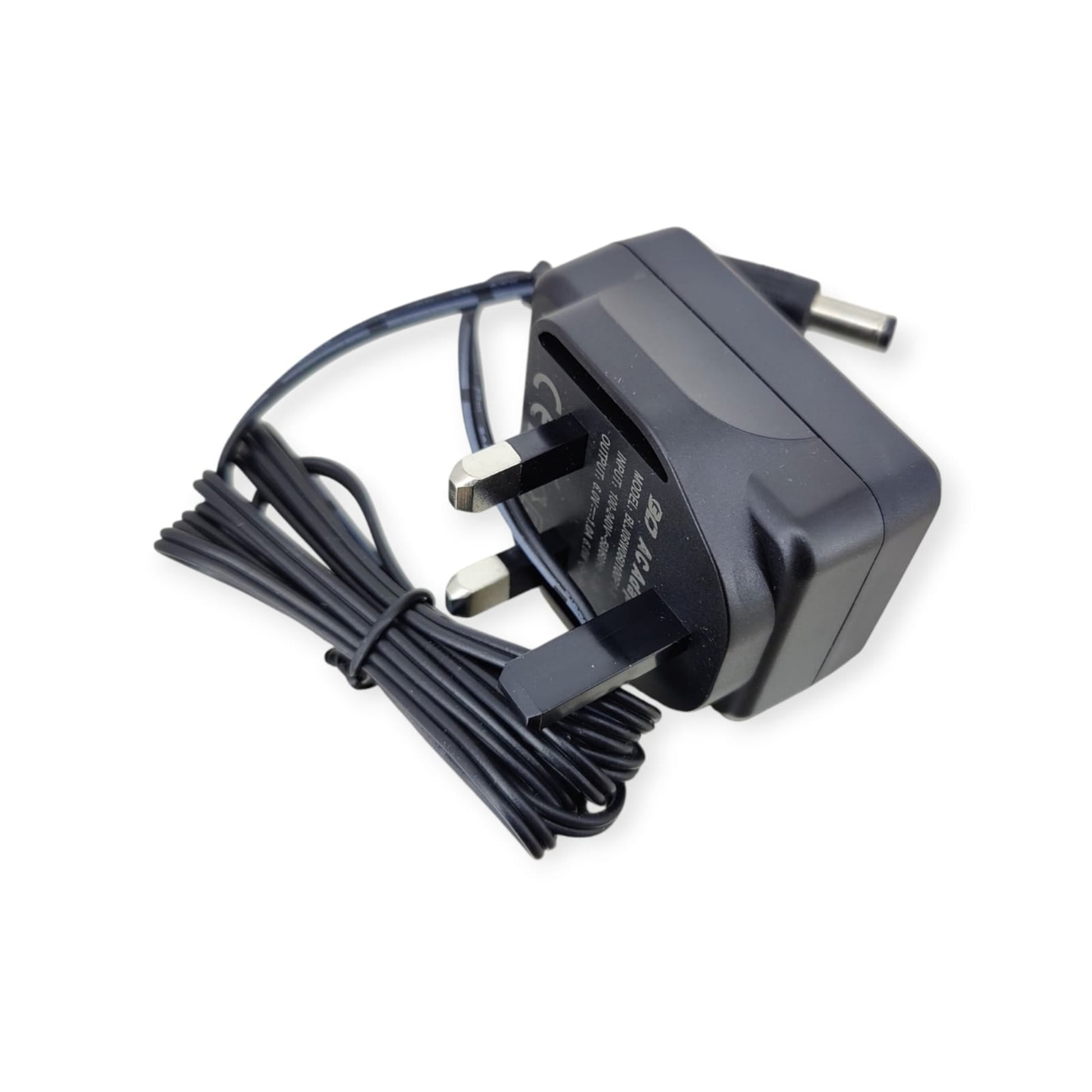 6V 1A UK power adapter showing model and output specifications, high quality.