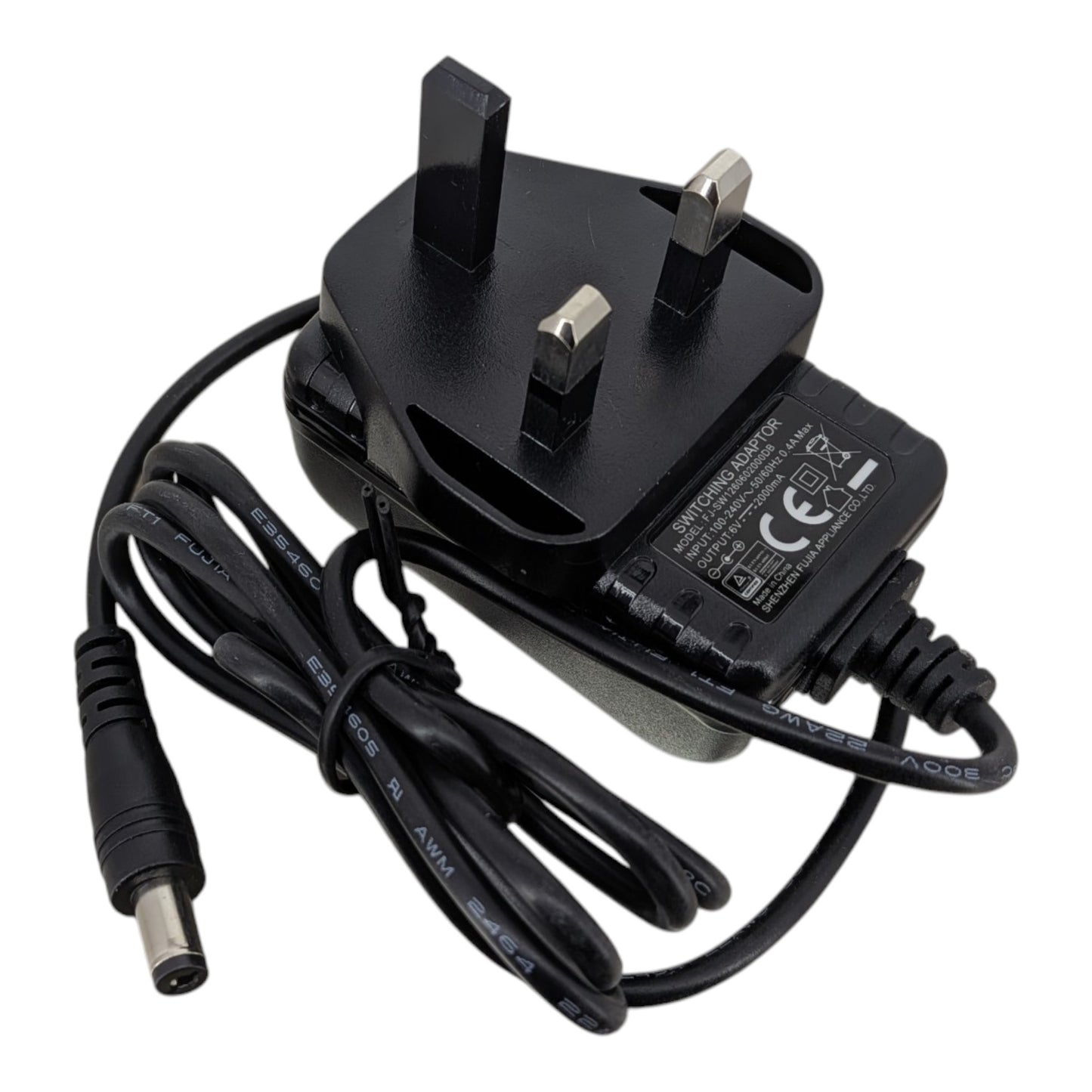 Top view of the 6V 2A AC power adapter showing the standard UK 3-pin plug and durable black casing.