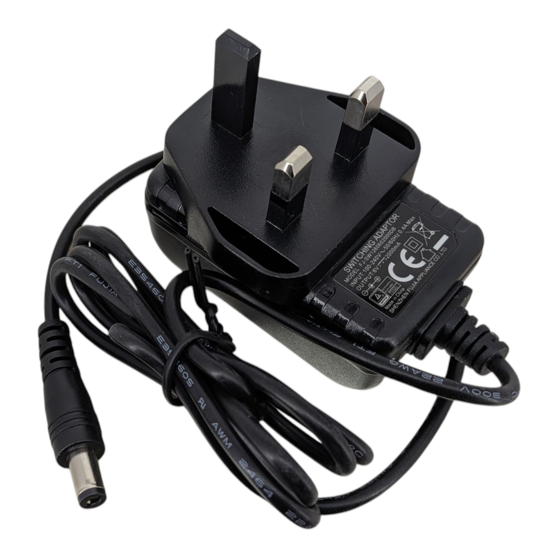 Top view of the 6V 2A AC power adapter showing the standard UK 3-pin plug and durable black casing.