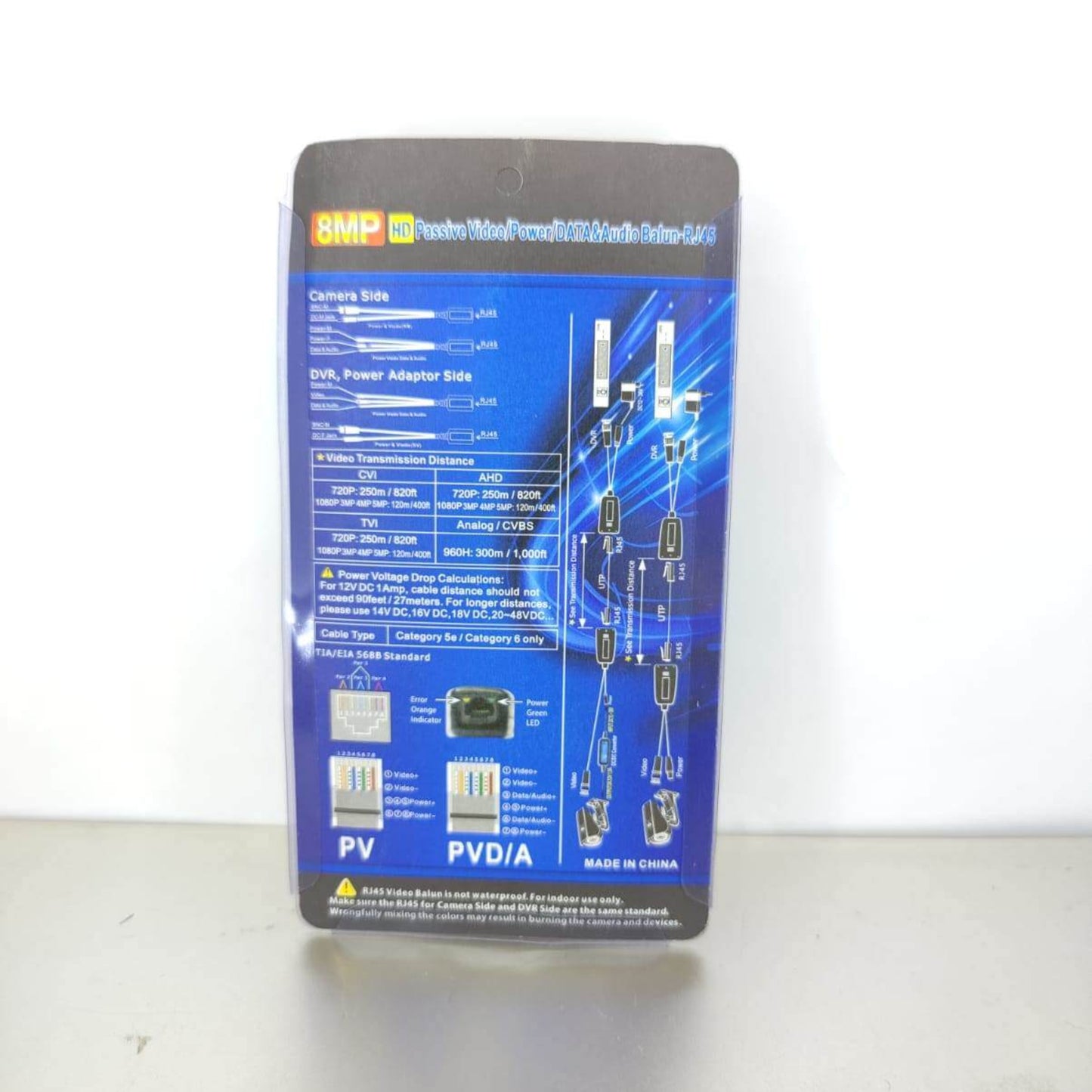 Back view of 8MP 4K Passive Video & Power Balun packaging, detailing specifications and connections for CCTV.