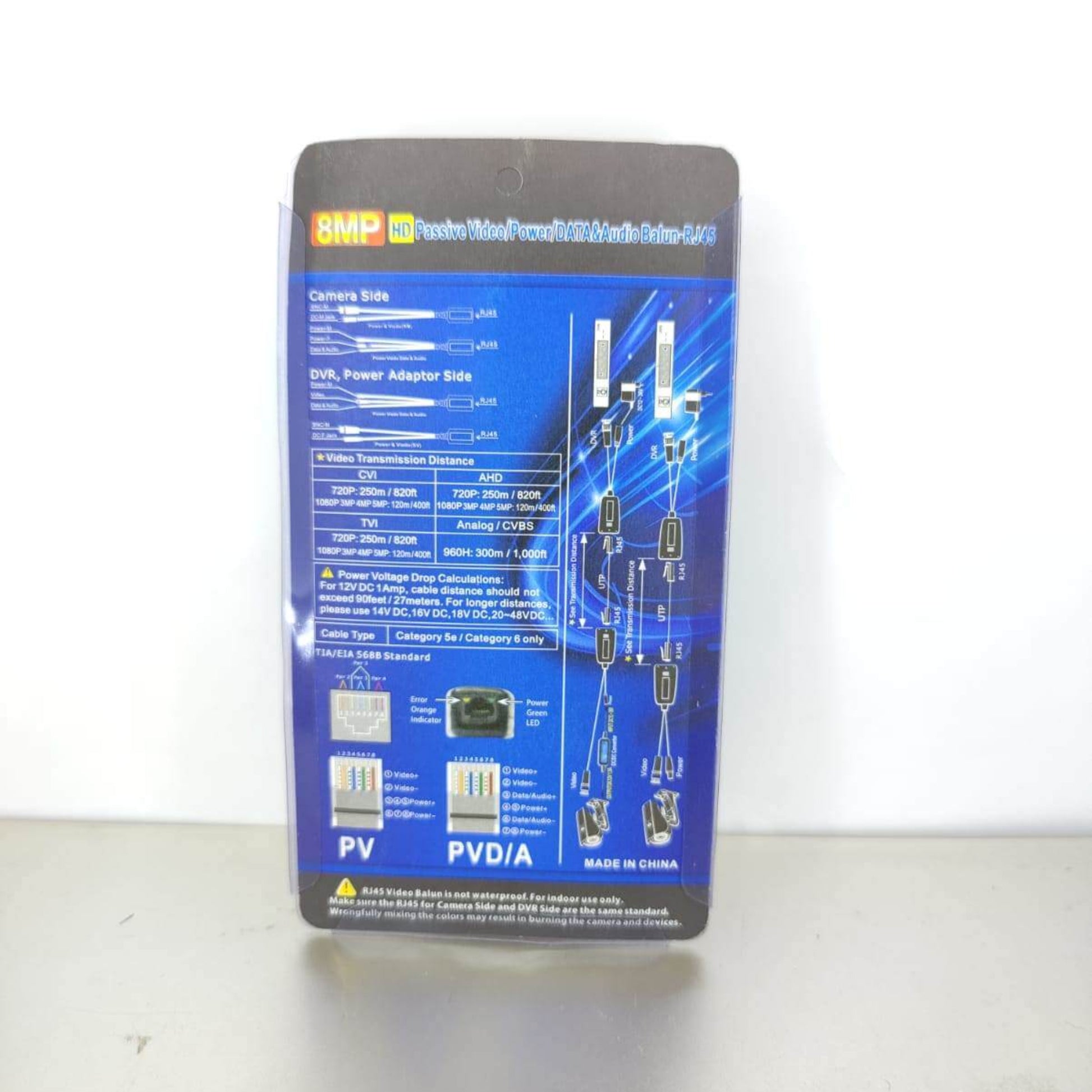 Back view of 8MP 4K Passive Video & Power Balun packaging, detailing specifications and connections for CCTV.