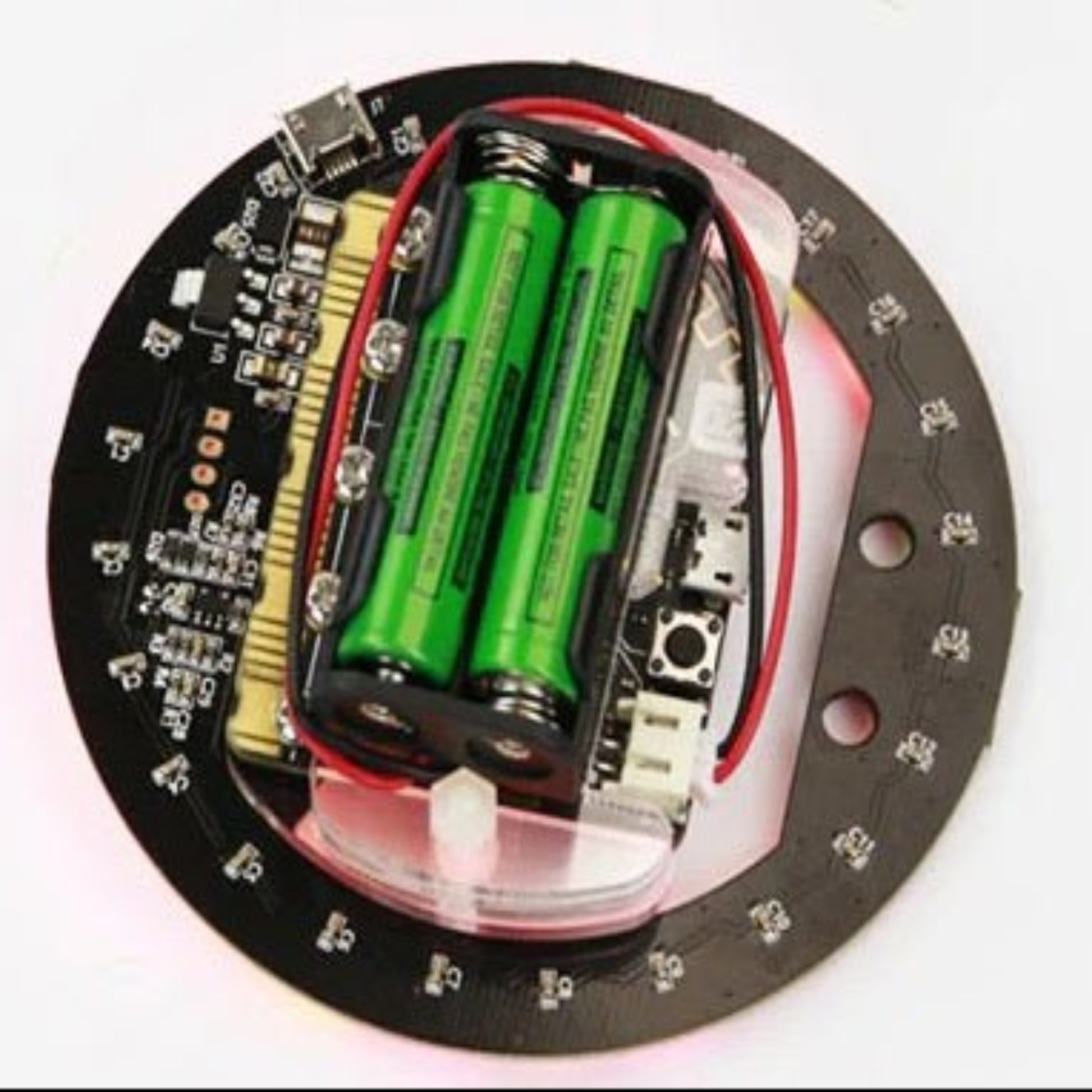 Micro:bit V2 RGB ring LED expansion board with battery compartment and programmable components.