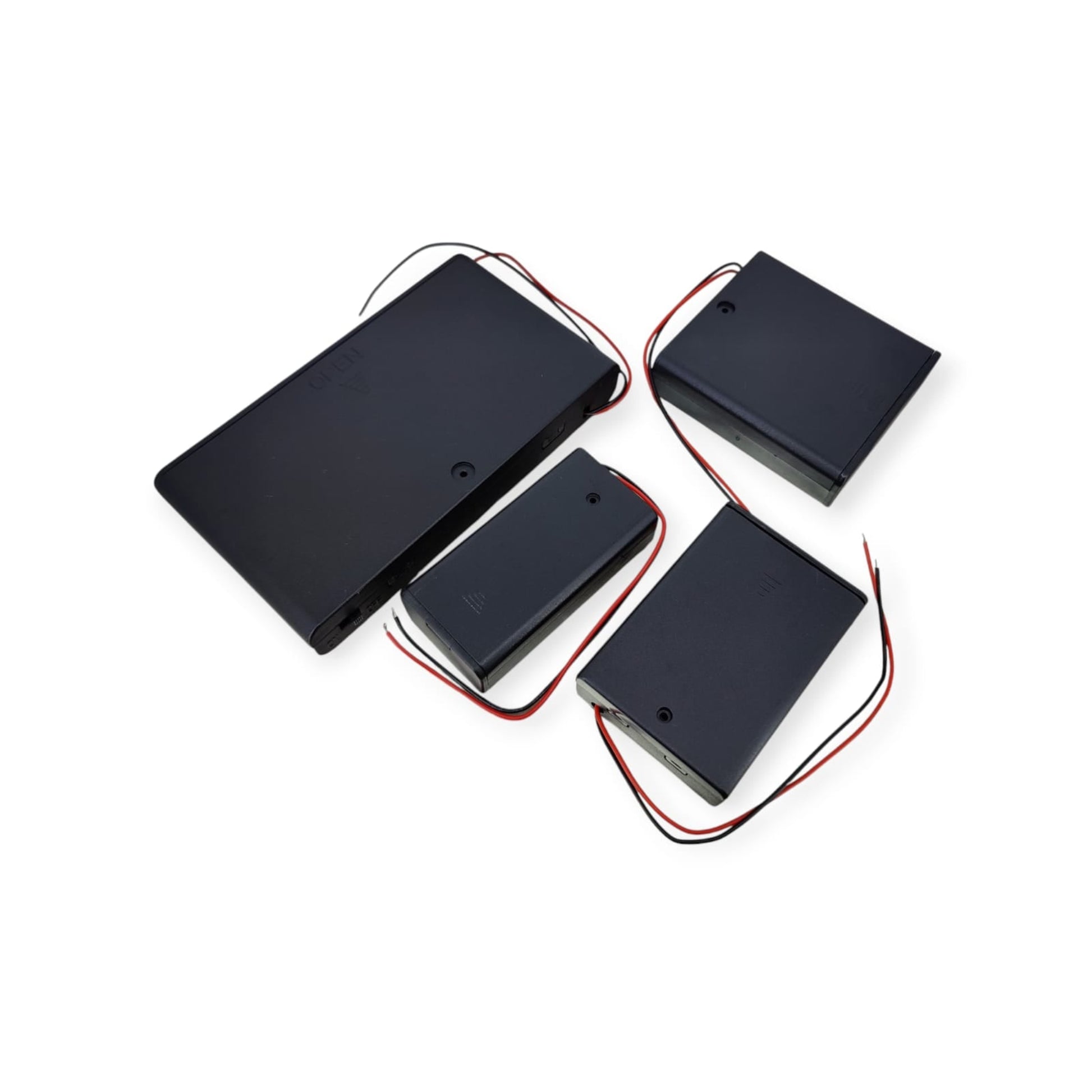 Four black AA battery holders of various sizes, including 2, 3, 4, and 8 slot options, all with leads.