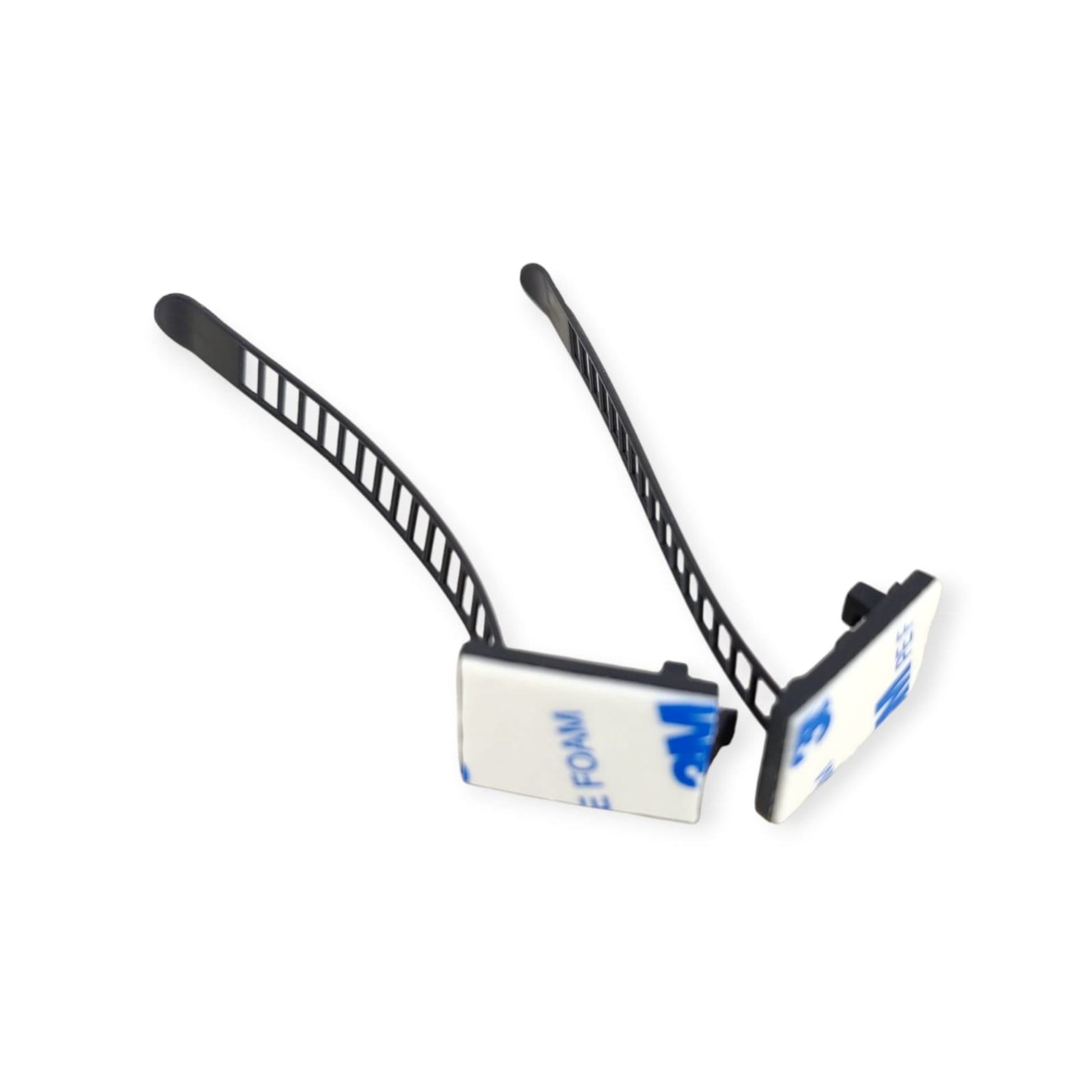 A close-up of two ACT22 cable clips showing the 3M foam adhesive backing used for mounting.