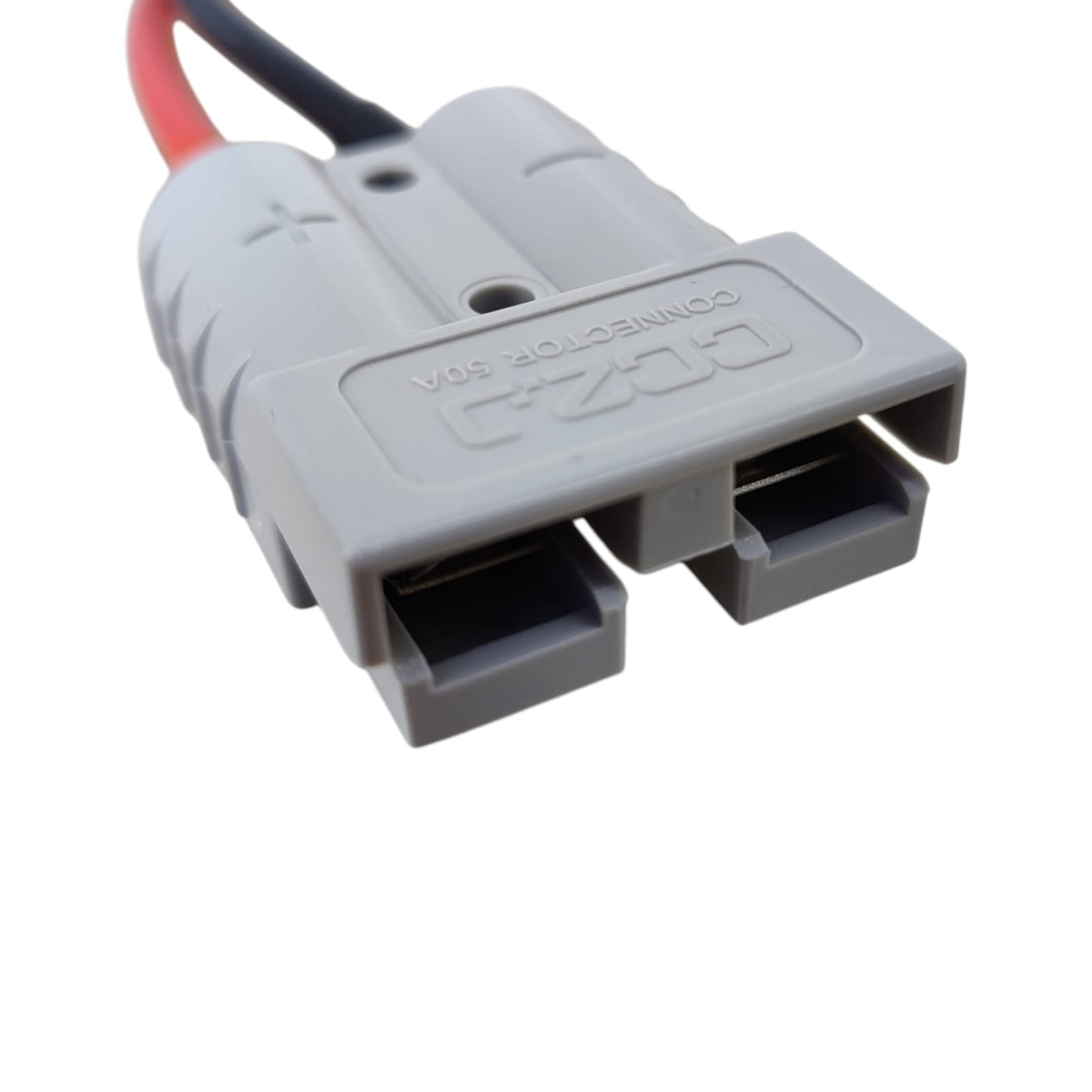 Close up of grey 50A Anderson style genderless connector with copper contacts