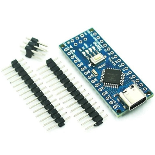 Angled view of the Nano V3.0 ATmega328P development board with USB-C connector, shown with included sets of unsoldered header pins.