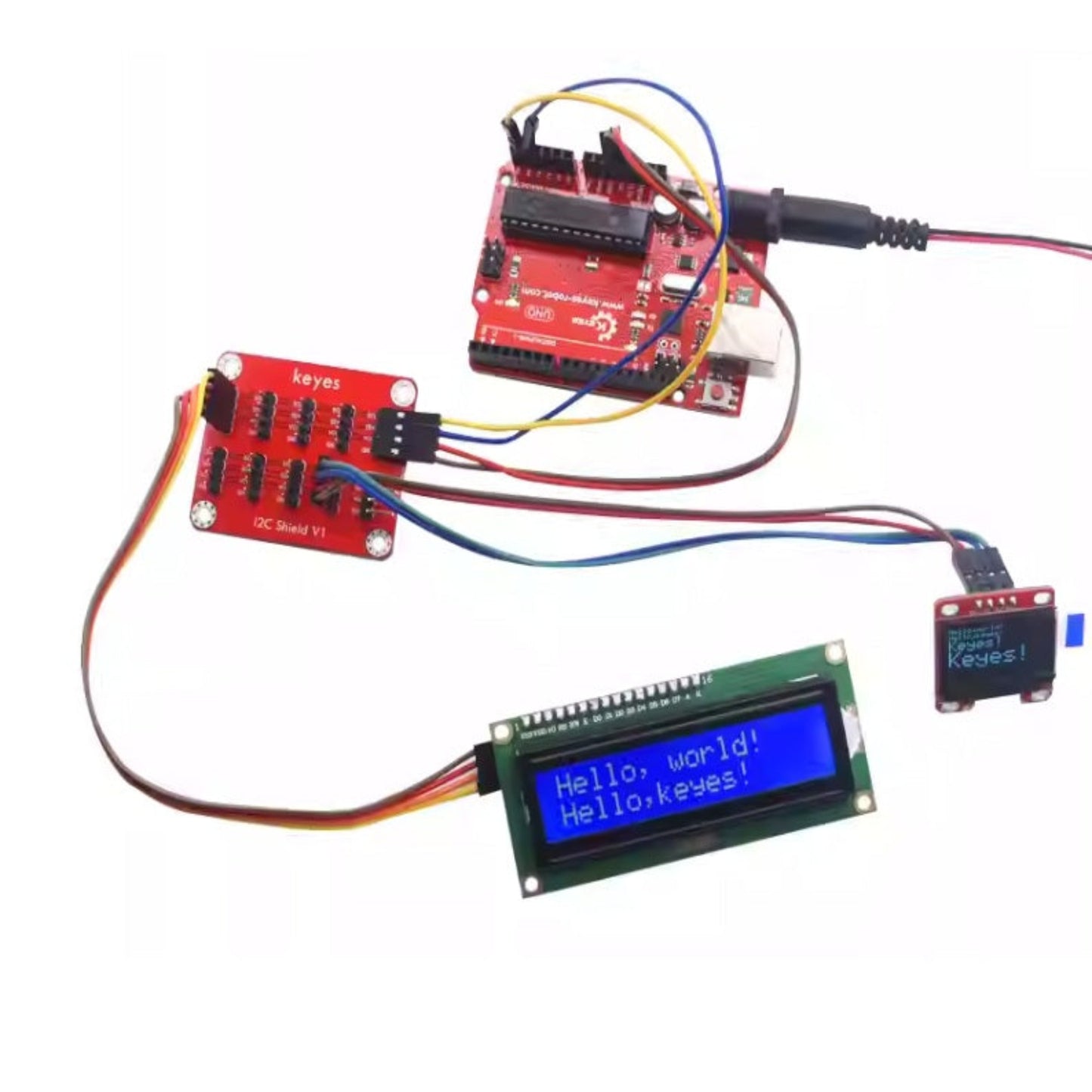 Arduino Uno connected to LCD and OLED screens via I2C expansion shield.