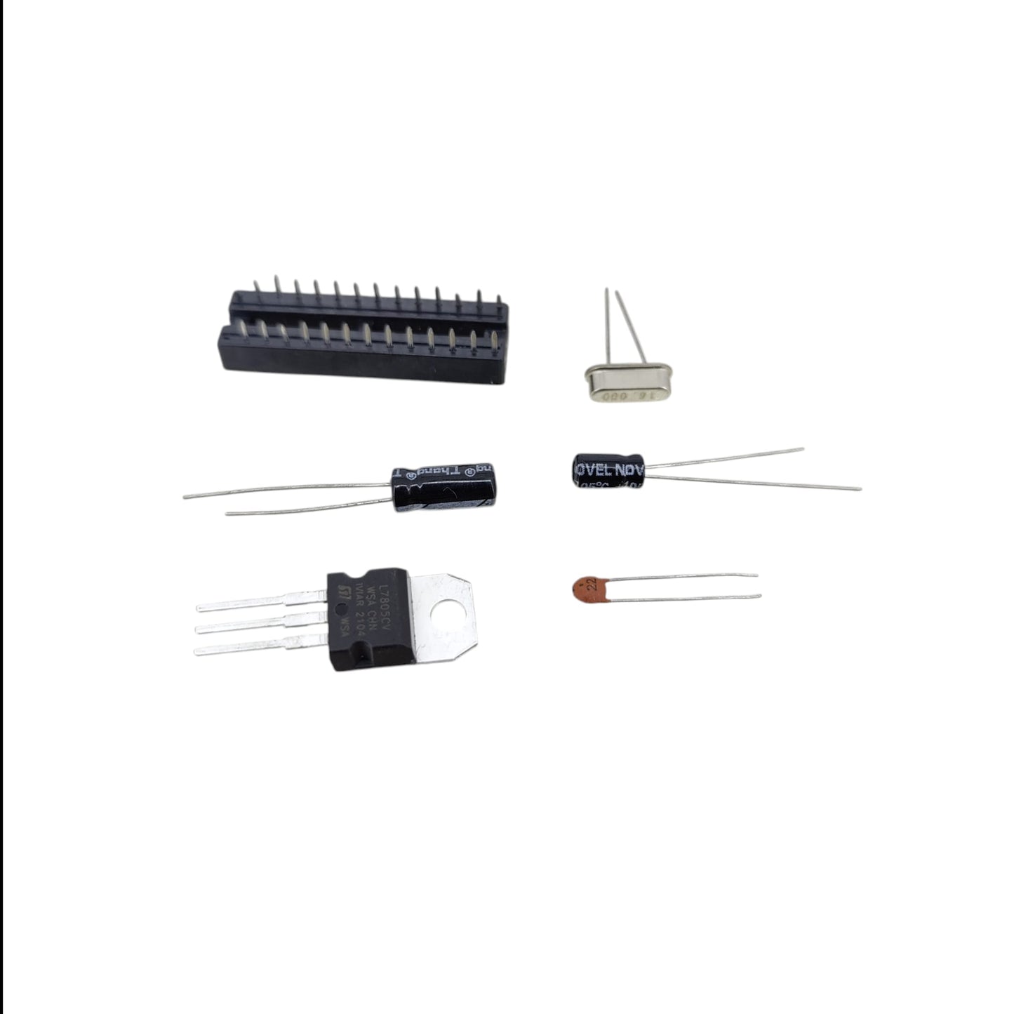Front view of the ATmega328P-PU IC socket and essential component kit with 16MHz crystal.