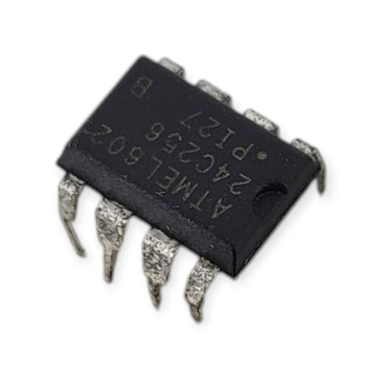 Top view of the Atmel AT24C256 256Kbit $I^2C$ EEPROM memory chip in an 8-pin DIP package.