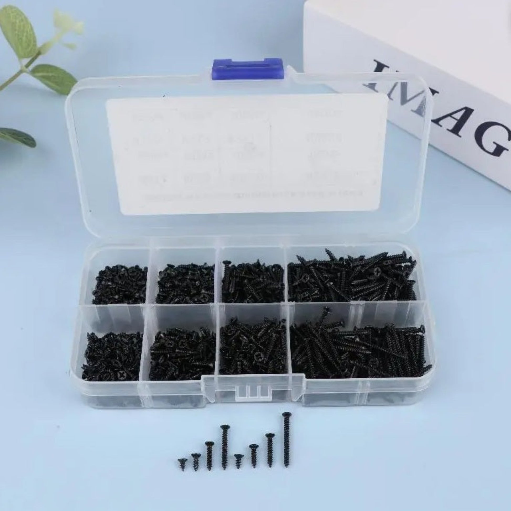 Open storage box displaying organized M2 black screws in 8 different sizes.