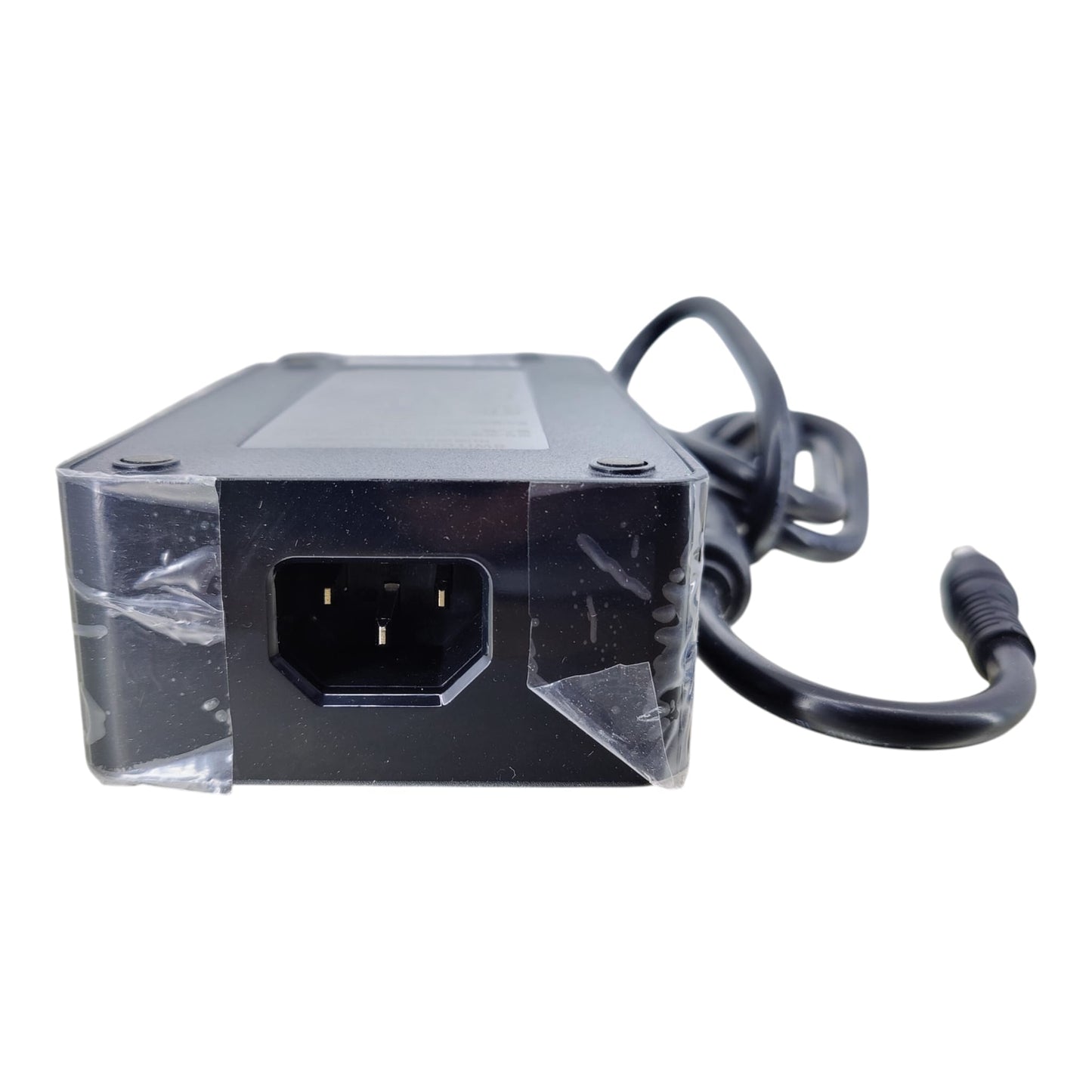 Standard IEC C14 AC power cord inlet on the back of the 24V 10A adapter brick.