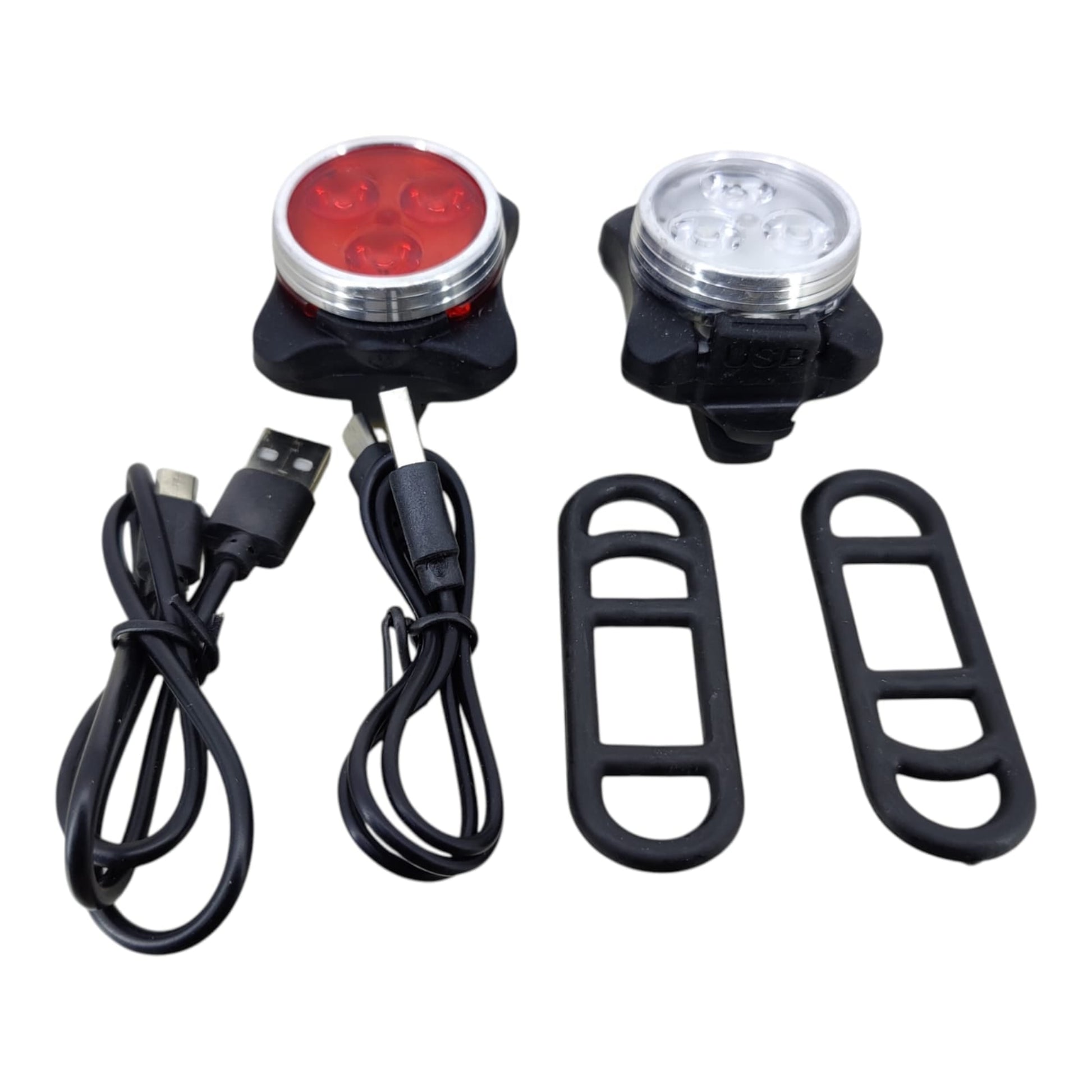 Full product package: front and rear lights, 2 USB cables, and 2 silicone mounting straps.