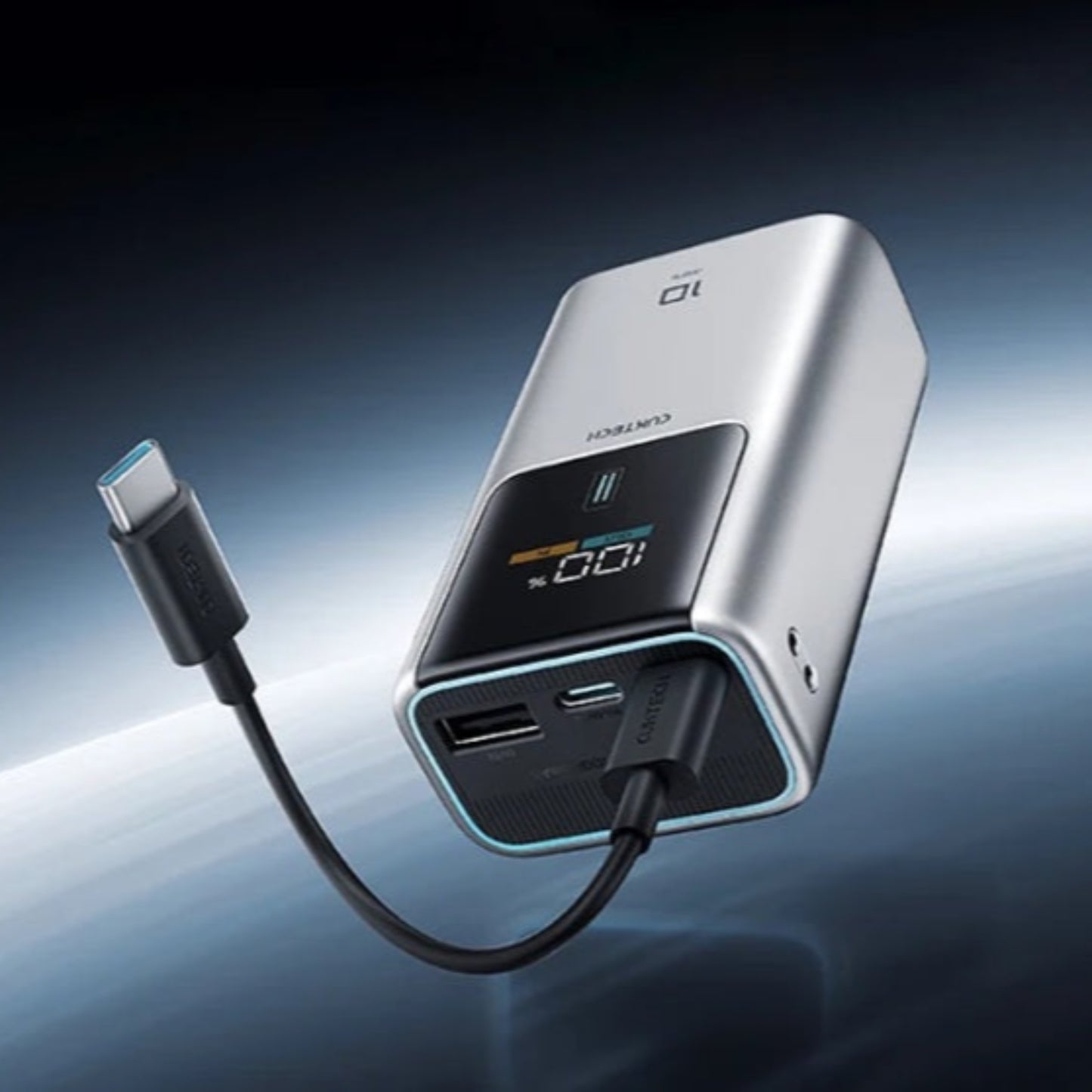 CUKTECH 10 10000mAh 55W power bank in silver with its detachable USB-C cable plugged in.