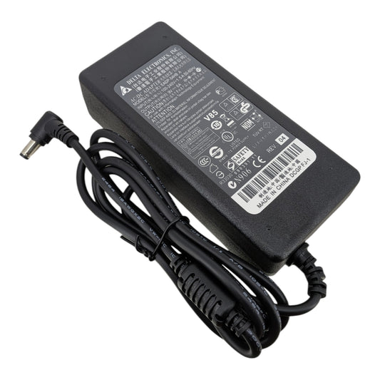 台達 Delta 9V 6A 電源適配器頂部標籤特寫，清晰顯示 EADP-54HB A 型號及 100-240V 國際電壓支援。