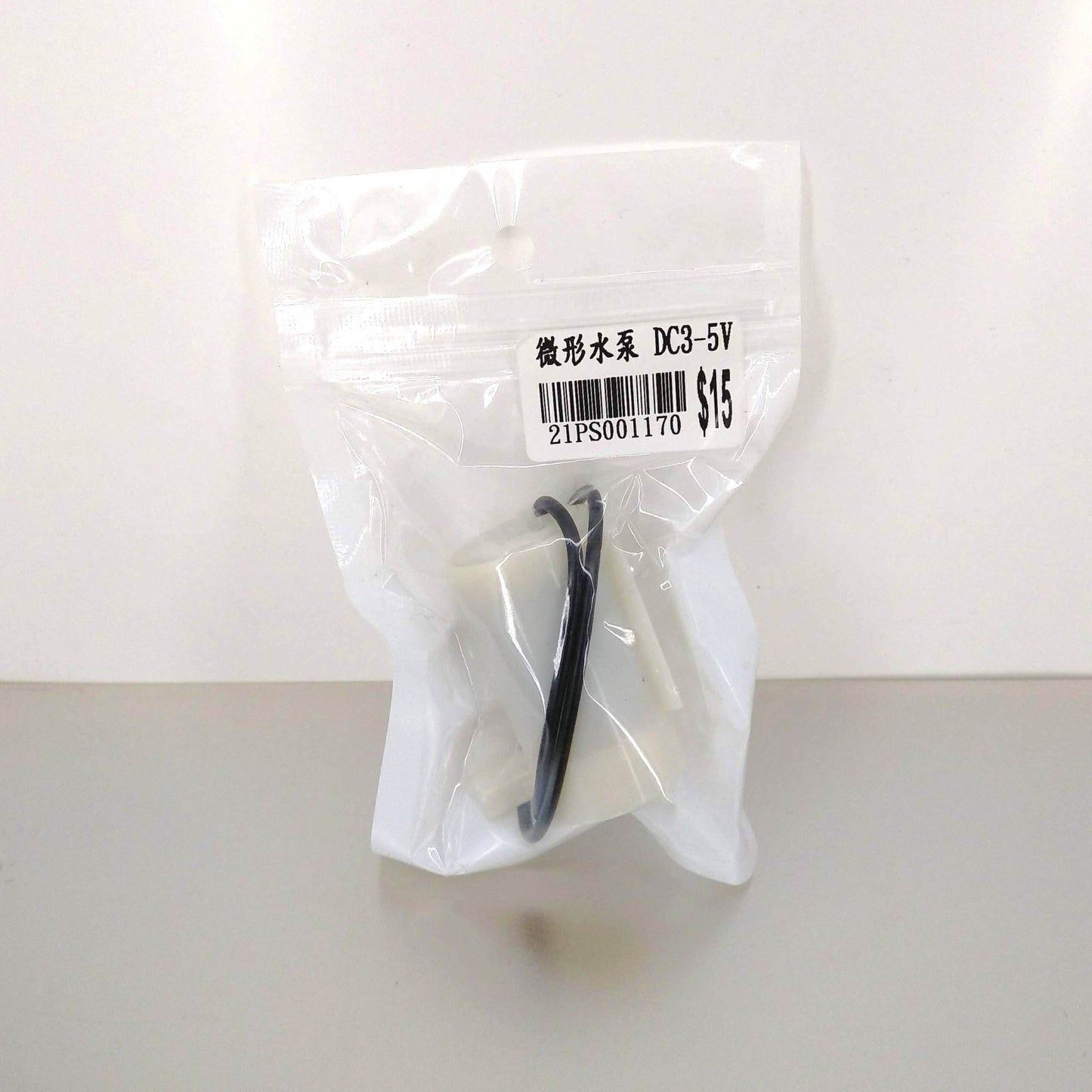 Packaged DC 3V-5V micro water pump ready for shipping.