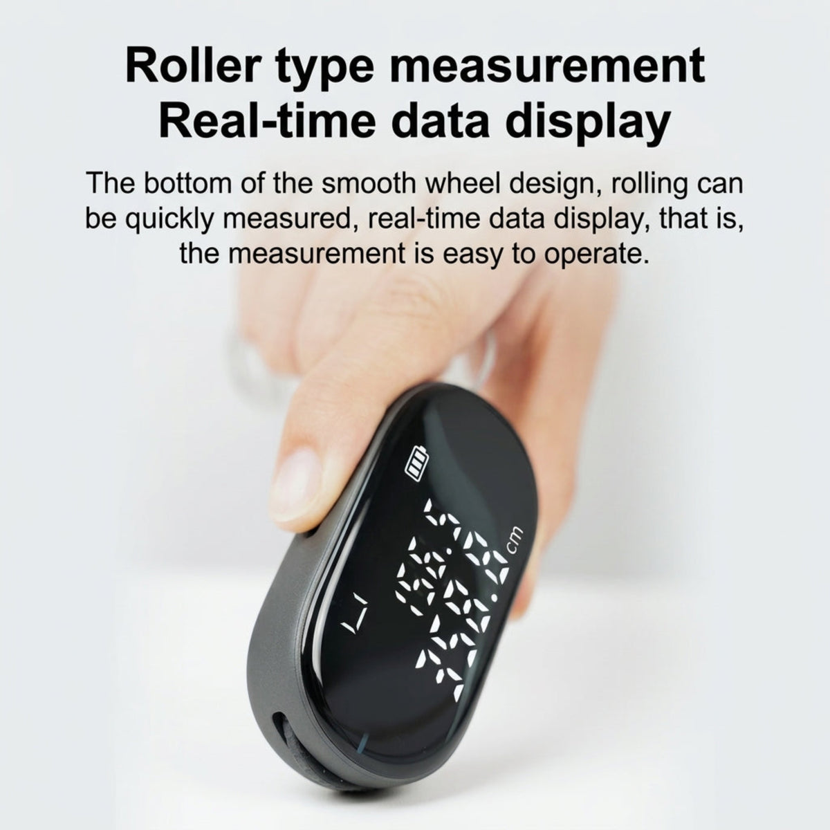 Handheld roller measurement with real-time digital display on DUKA ATuMan Q2 ruler.