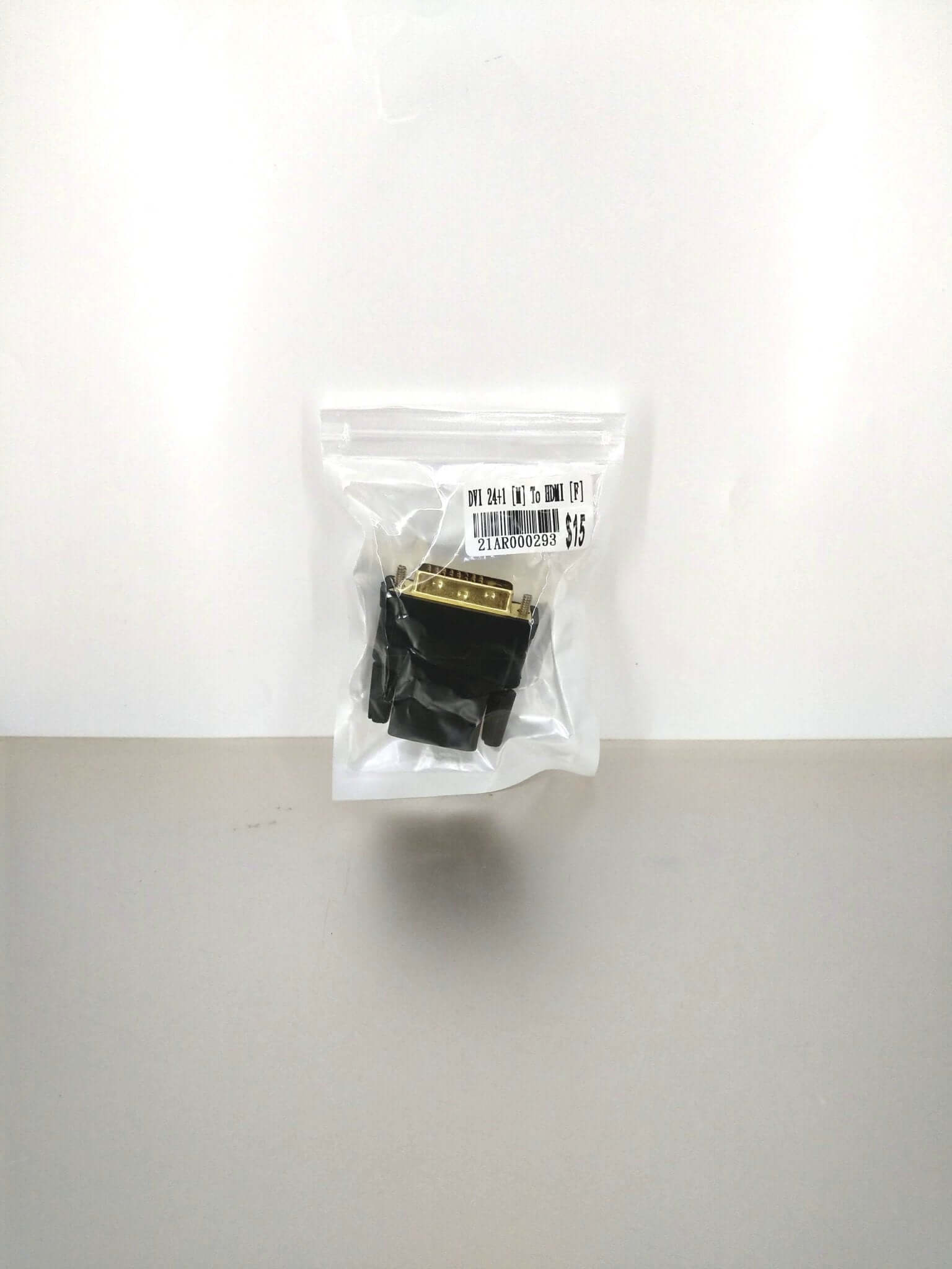 DVI-D to HDMI adapter in product packaging.