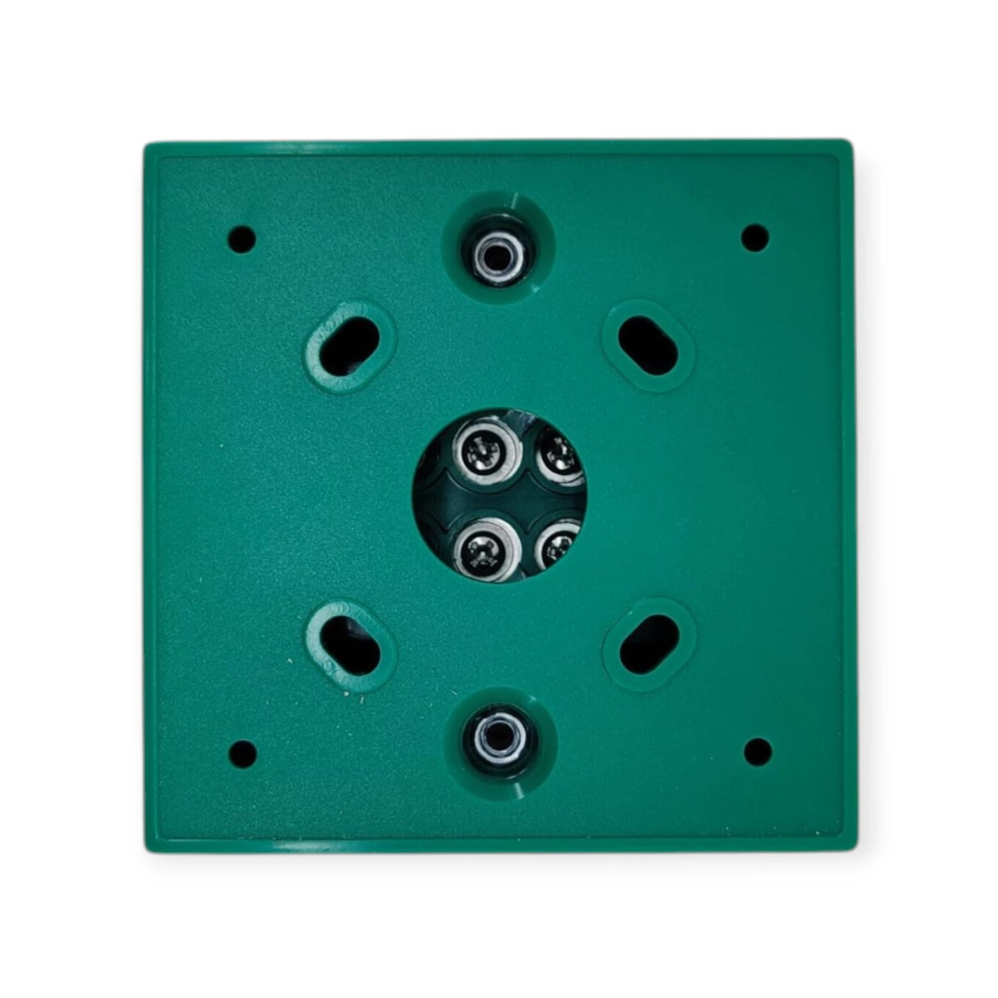 Rear view of the emergency door release switch showing the NO, NC, and COM wiring terminals.