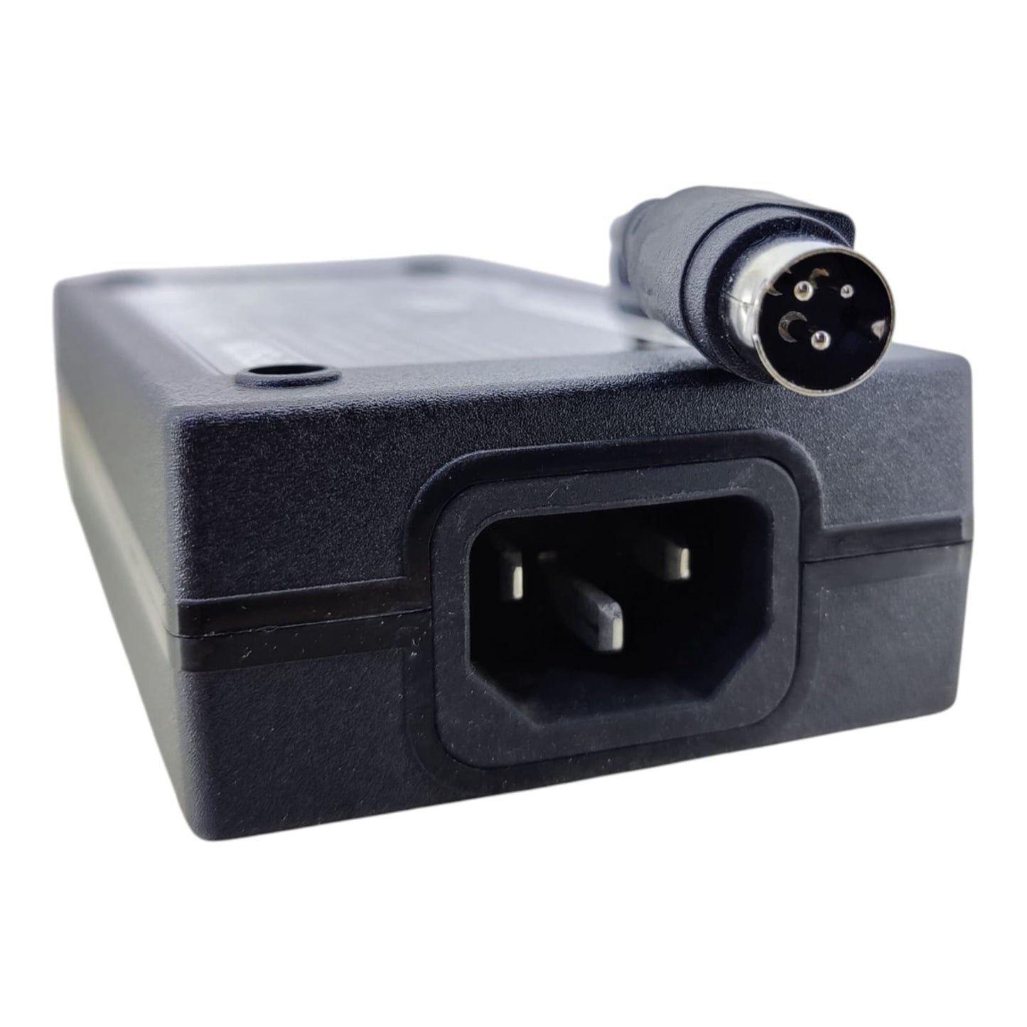 A close-up view of the Epson PS-190 adapter's 3-pin mini-DIN output connector and the 3-prong IEC C14 power input socket.