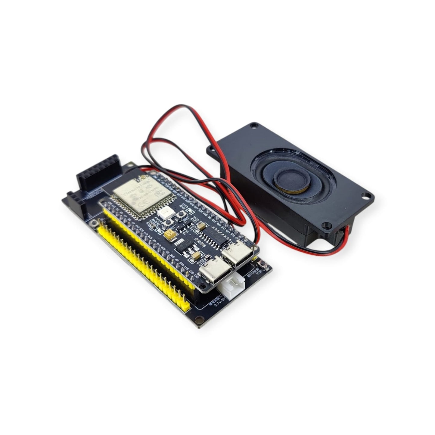 A close-up of the ESP32-S3 AI board connected to the voice expansion board and 3W speaker.