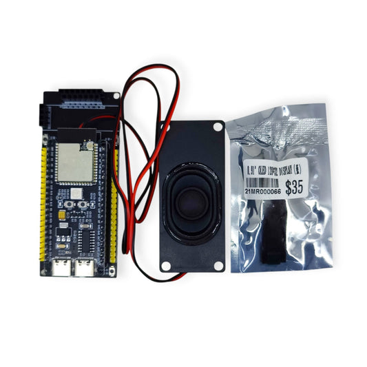 All unboxed components of the ESP32 Voice AI Kit, including the ESP32-S3 board, speaker, and OLED display package.