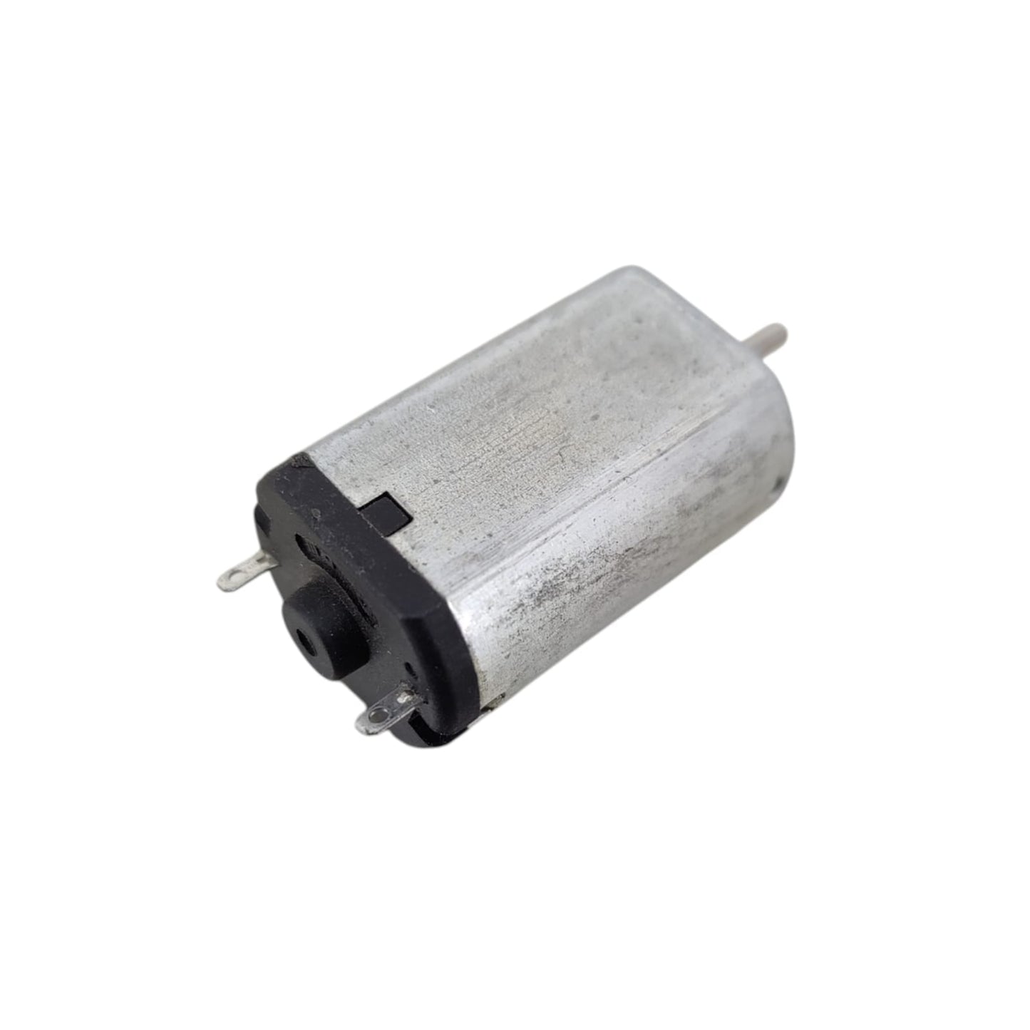Small cylindrical motor on a white background