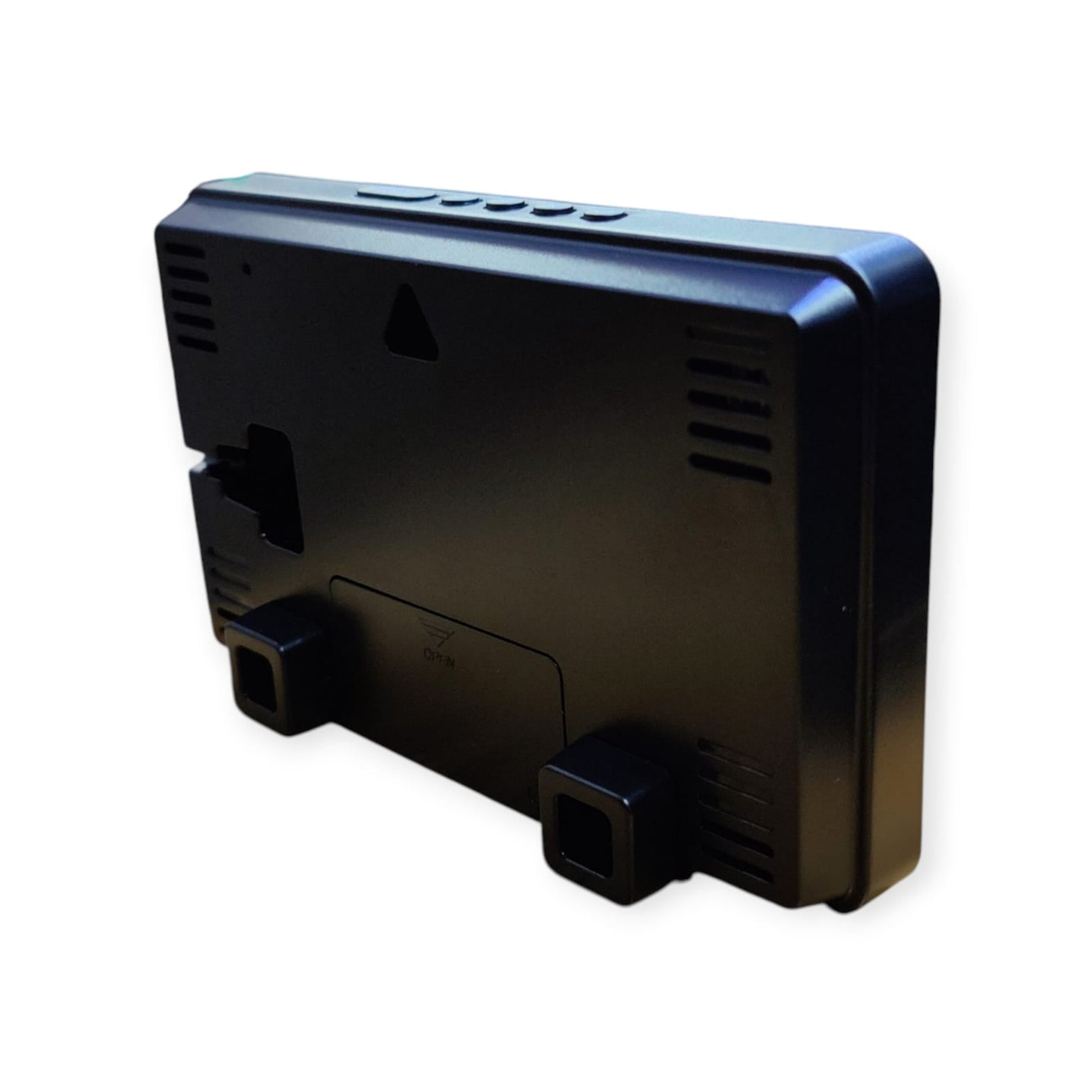 Back view of the black LED alarm clock, showing the battery compartment, wall-mount hole, and removable table stands.