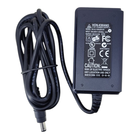 Close-up of the specifications label on a black HON-KWANG 12V 2A power adapter, model HK-P112-120A200-DH.