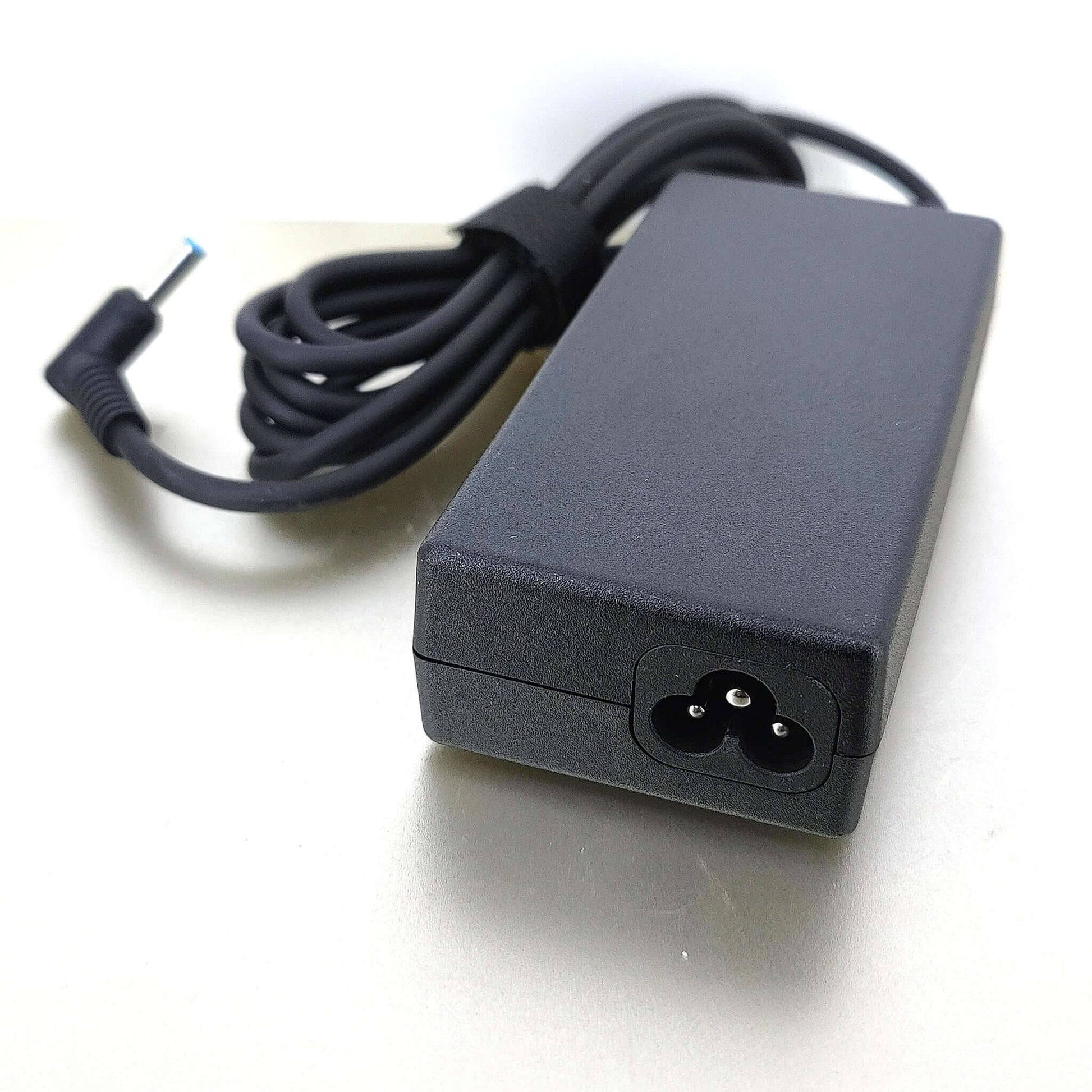 HP 19.5V 3.33A laptop charger with 4.5x3.0mm blue tip DC connector.