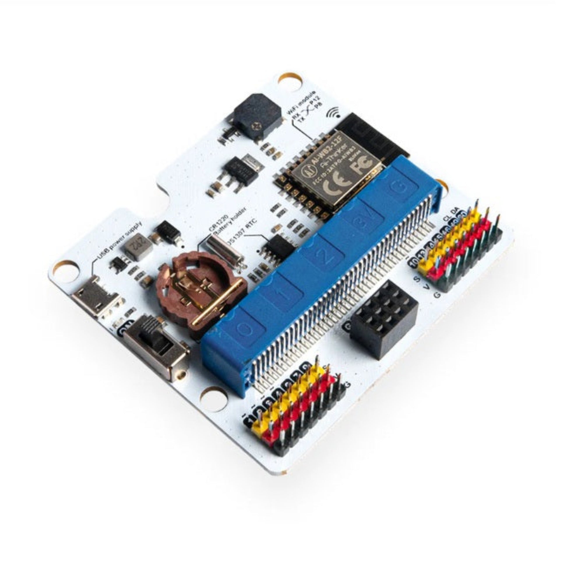Angled view of IoT:bit expansion board highlighting the blue GVS pin headers and power switch.